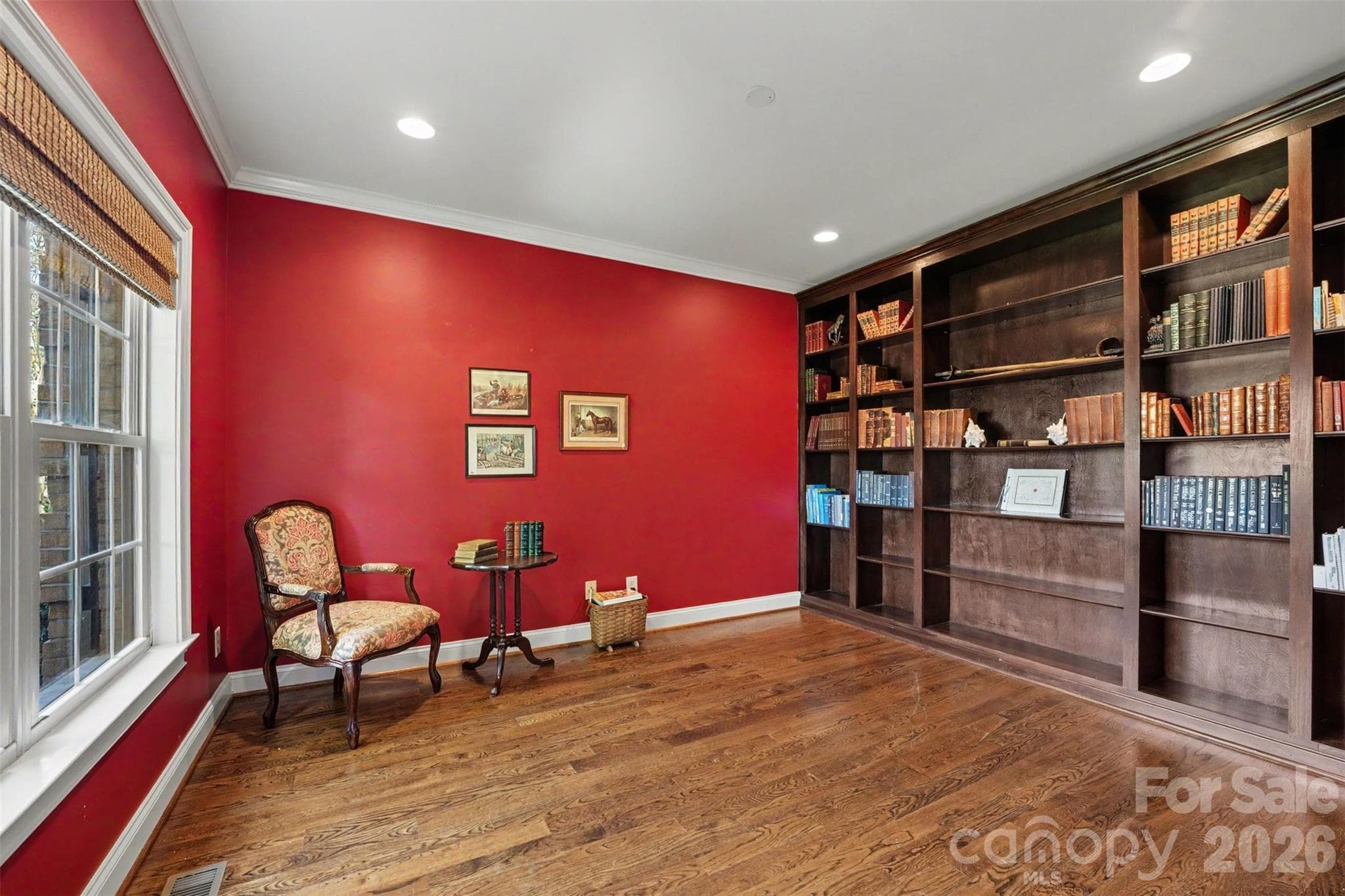 This formal front office has solid wood custom built in shelves and plenty of room for a large desk and chairs. - 120 Palos Verde Drive, Mooresville