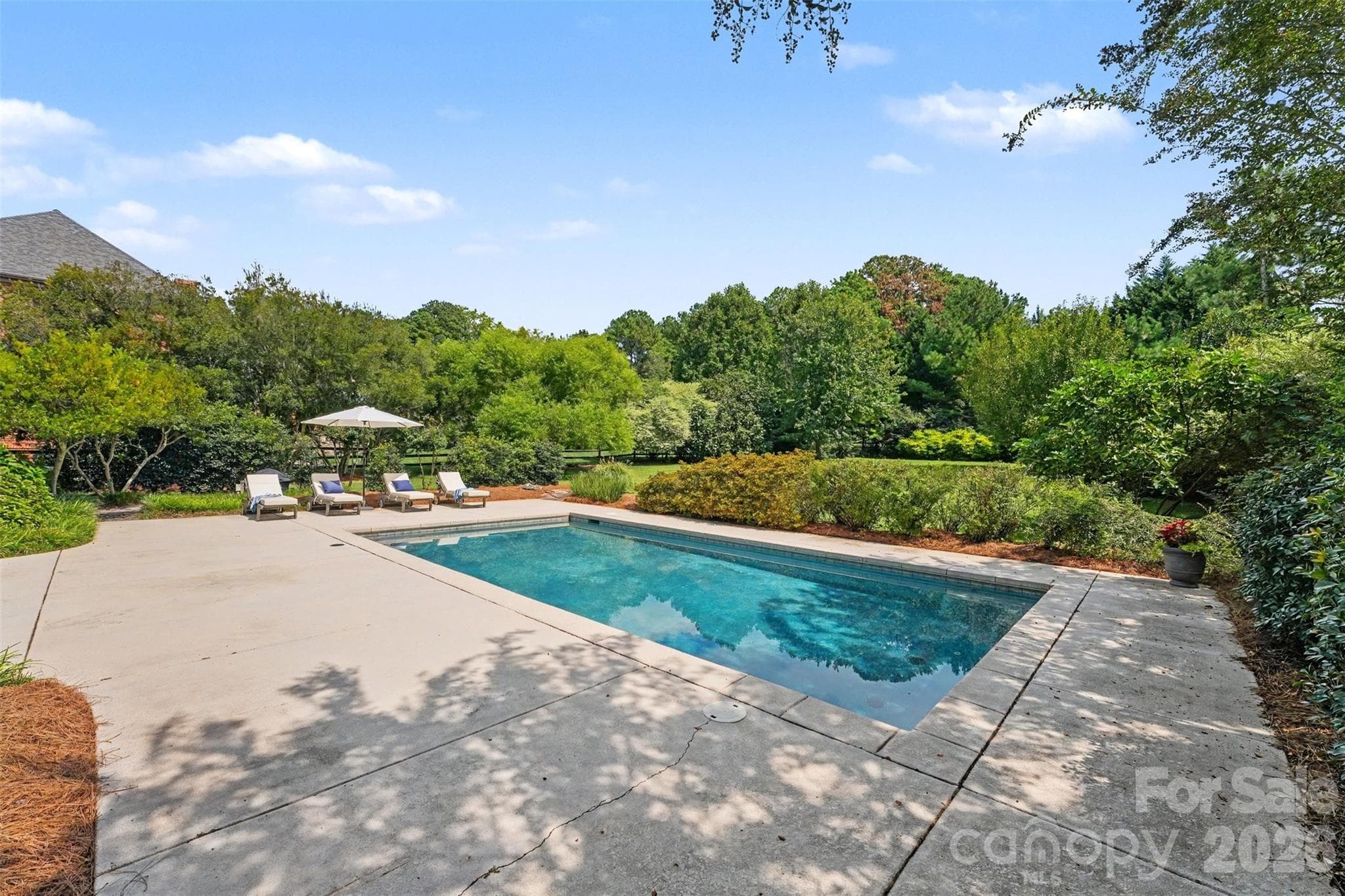 The pool is surrounded by cool decking to keep your feet from burning in the hot summer months.  approximately 1,280 square feet of decking. - 120 Palos Verde Drive, Mooresville