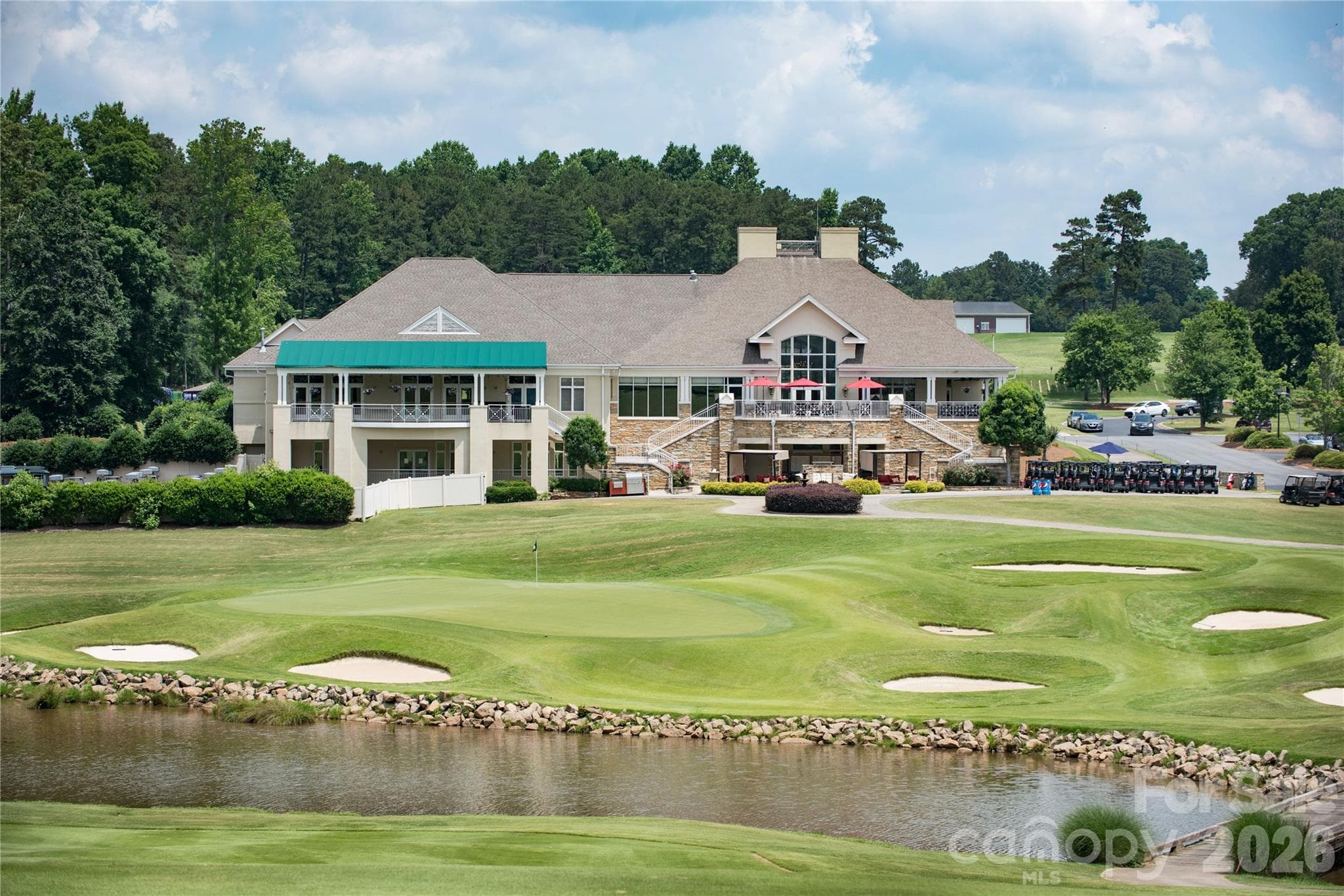 Northstone Club is a private club that offers an award-winning golf course, 7 tennis courts, 4 pickleball courts, 4 swimming pools, fitness center, restaurant, and clubhouse. - 12822 Cadgwith Cove Drive, Huntersville