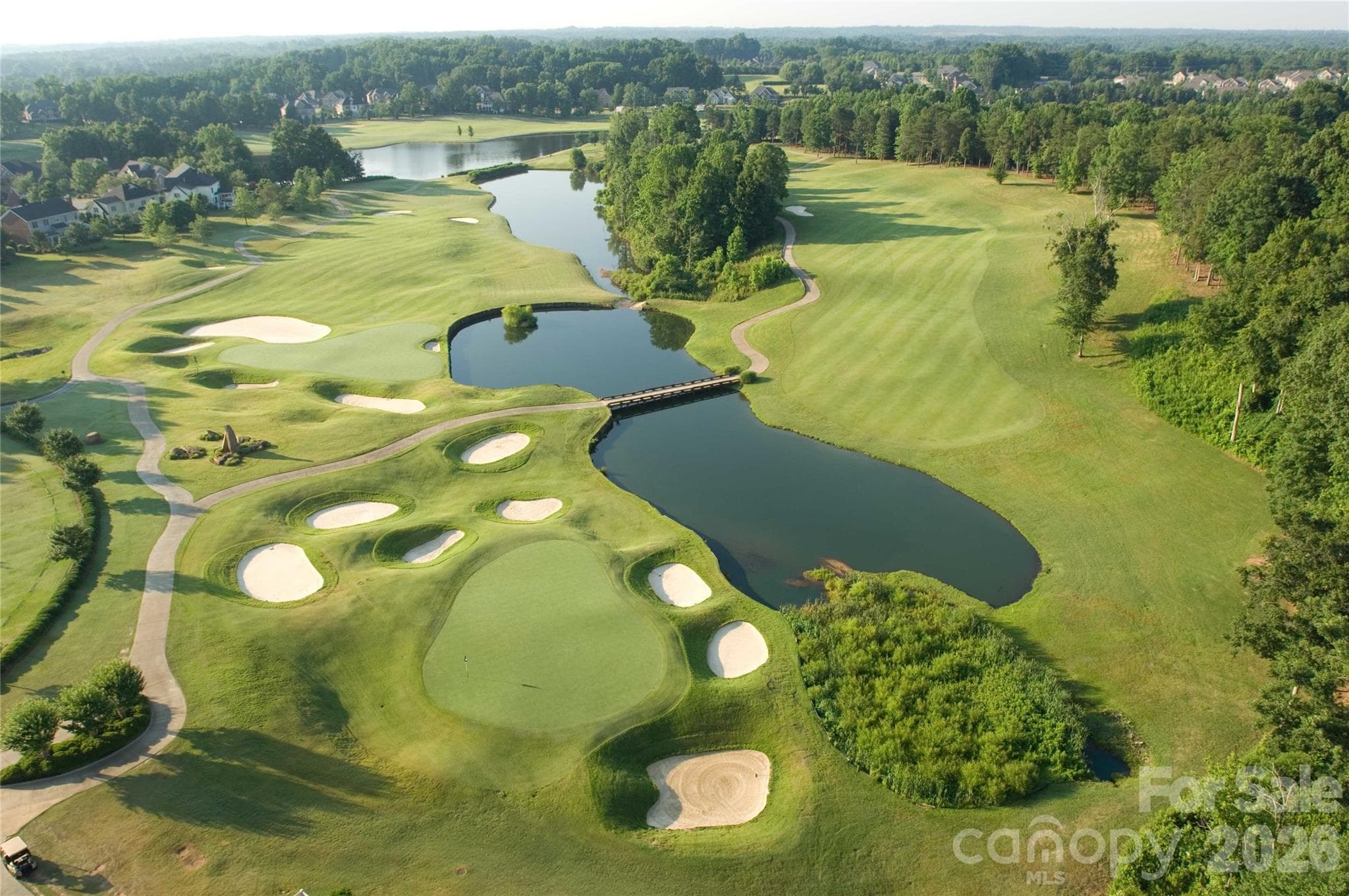Aerial view of 9th and 18th holes of the award winning PB Dye golf course. - 12822 Cadgwith Cove Drive, Huntersville