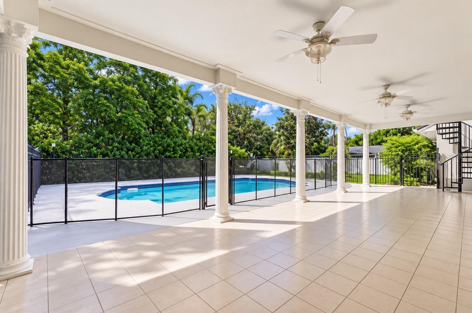 Downstairs Back Patio - 9102 S BAY DR, ORLANDO