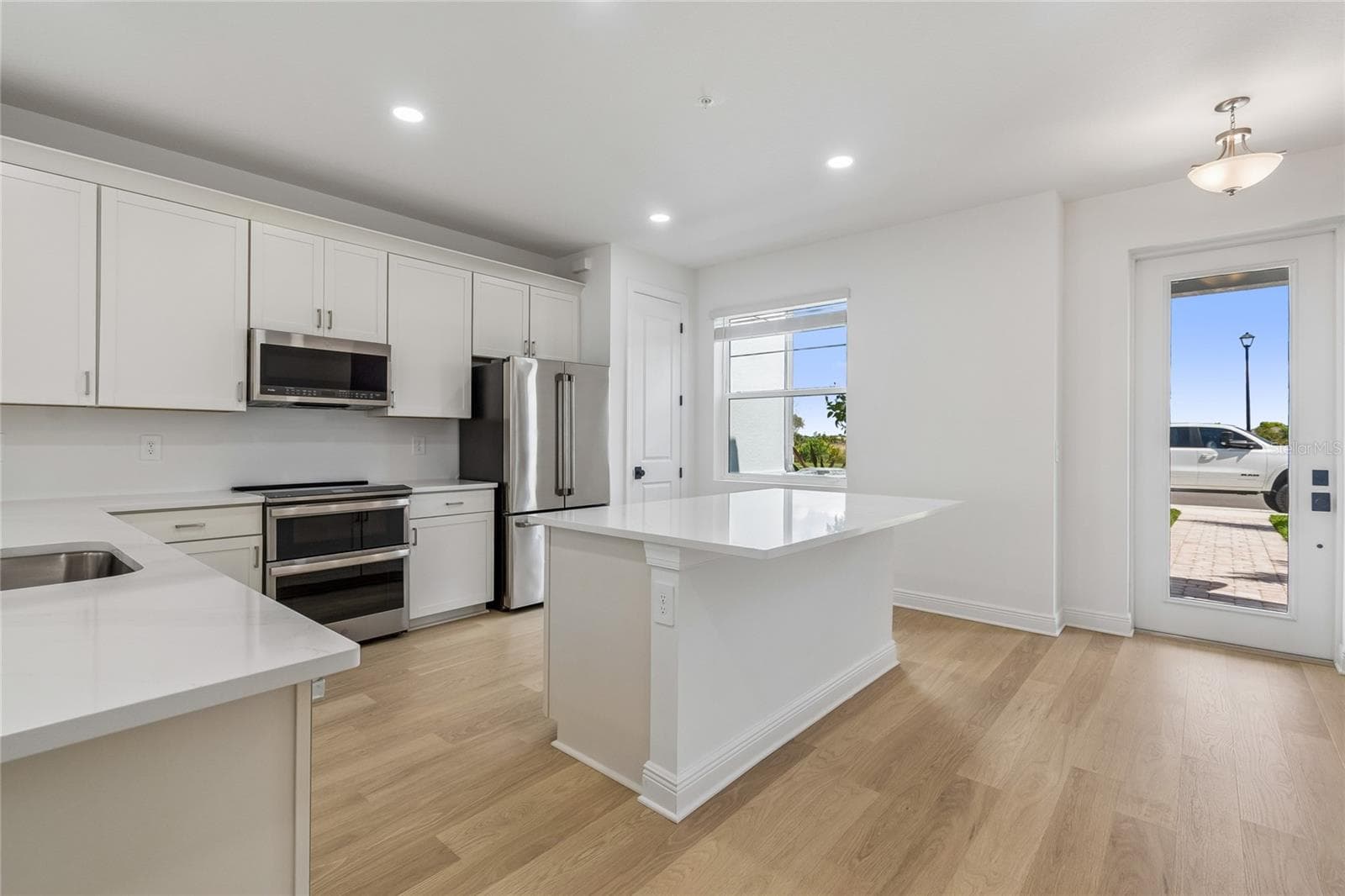Kitchen-Photo description represents the model home of same floor plan. - 17830 BROADLEAF LOOP, VENICE