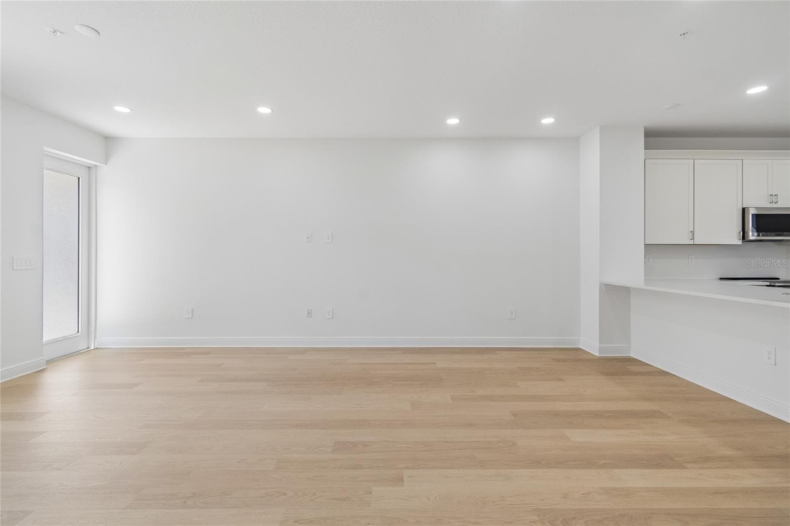 Great Room-Photo description represents the model home of same floor plan. - 17830 BROADLEAF LOOP, VENICE