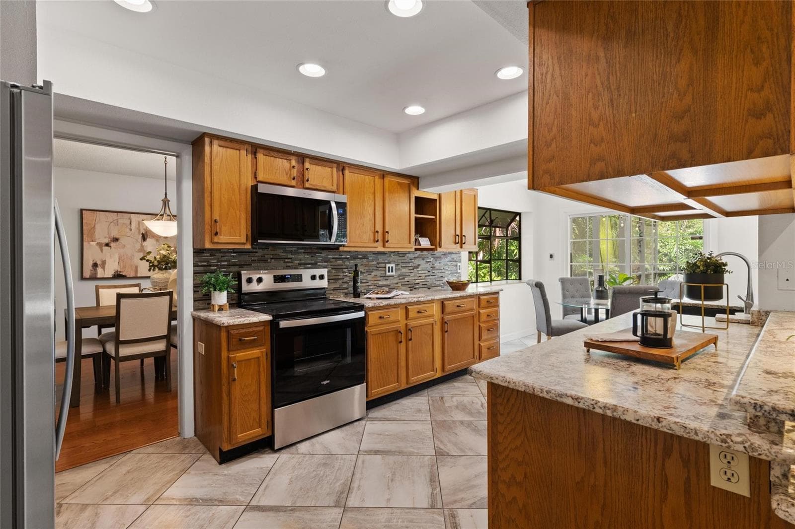 Light-filled and spacious kitchen - 2784 HEATHERWOOD CT, CLEARWATER