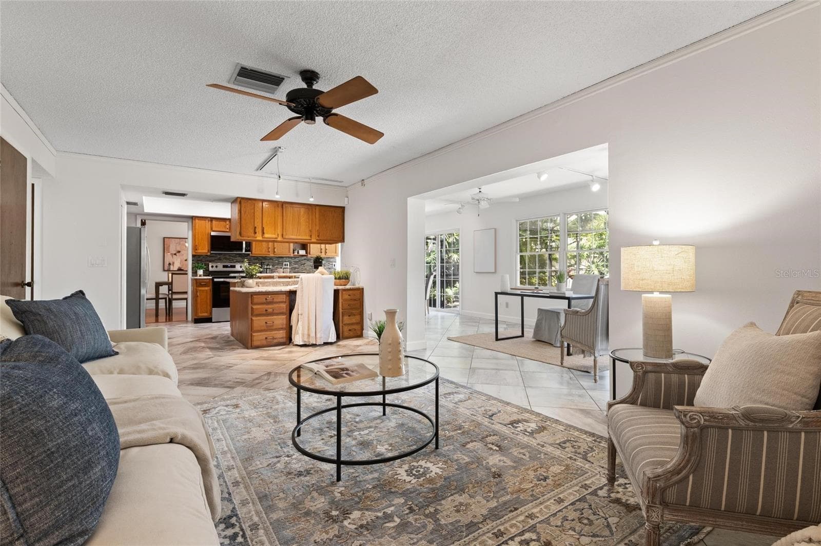 Family room looking towards kitchen - 2784 HEATHERWOOD CT, CLEARWATER