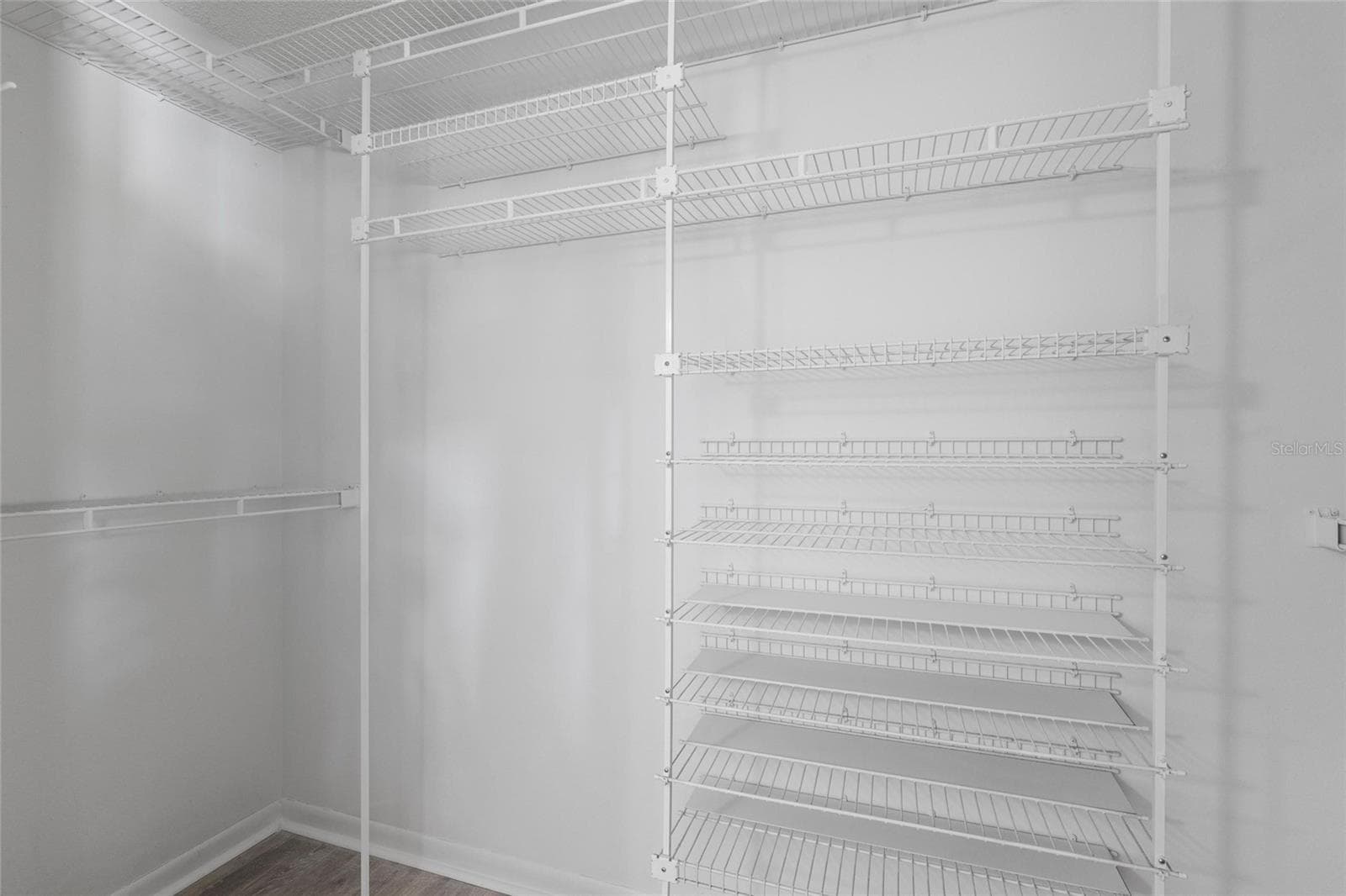 Spacious walk-in primary closet - 2784 HEATHERWOOD CT, CLEARWATER