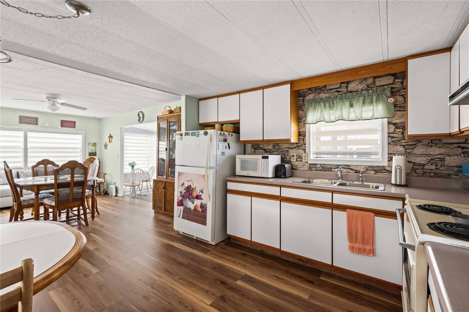 This area has luxury vinly plank flooring - 36917 GRACE AVE, ZEPHYRHILLS