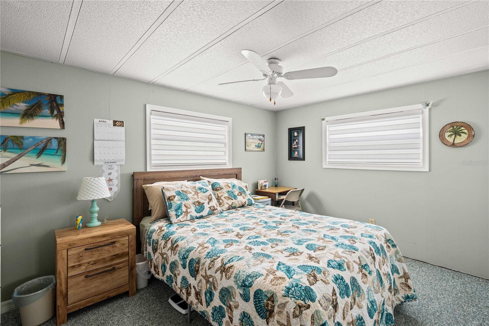 The primary bedroom sits at the back of the home - 36917 GRACE AVE, ZEPHYRHILLS