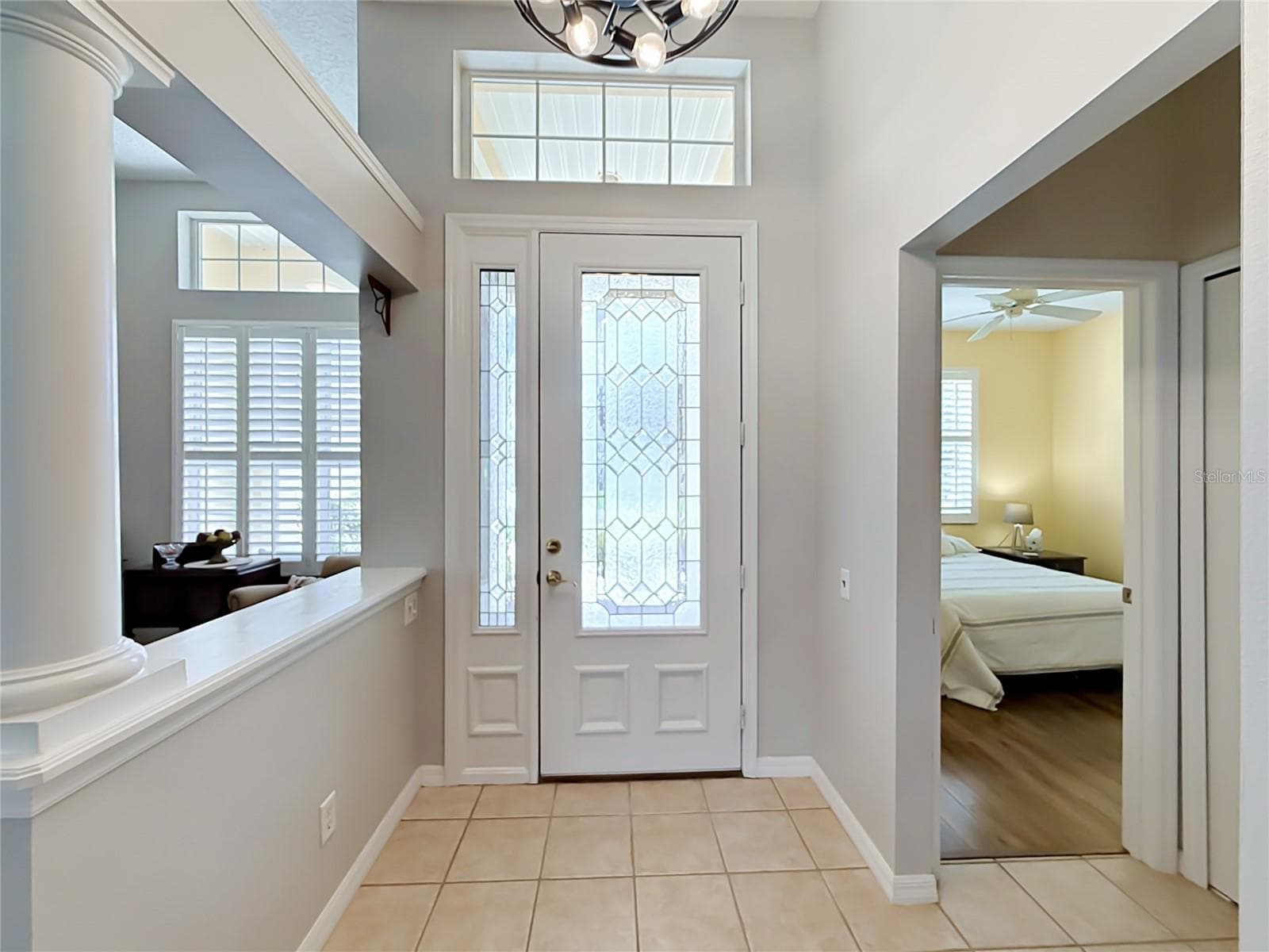Foyer entrance with Beautiful Leaded Glass Front Door - 5693 GULF STREAM STREET, TAVARES