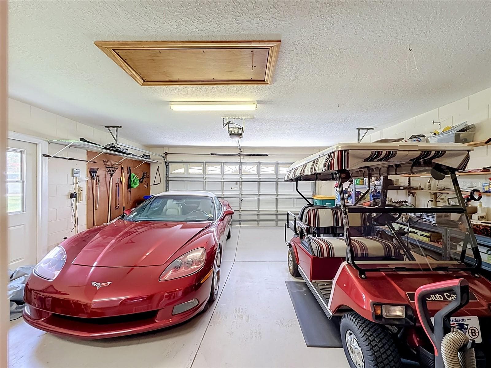 Two Car Garage and the Golf Cart is Included in the Sale! - 5693 GULF STREAM STREET, TAVARES