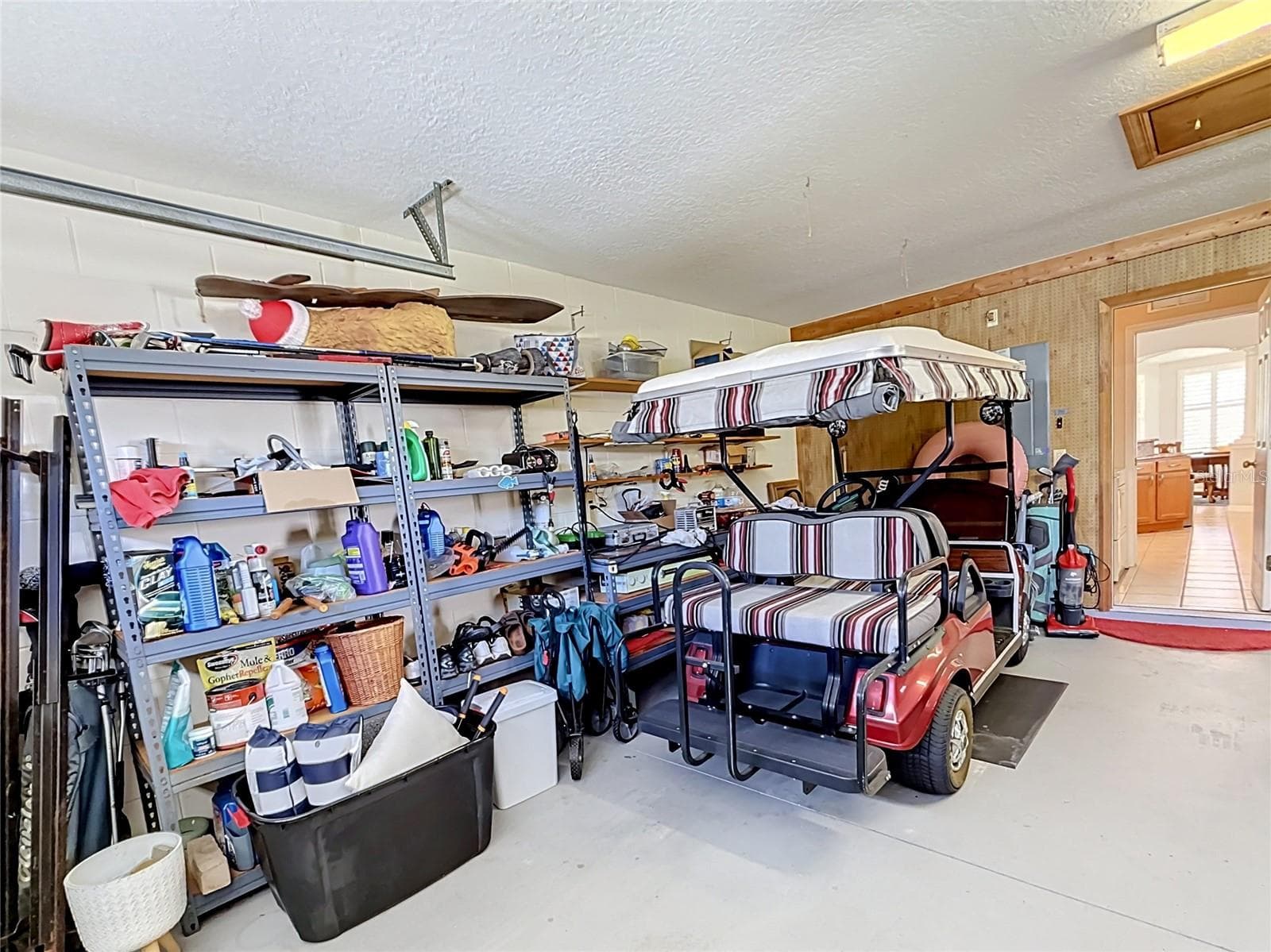 Garage entrance into Laundry Room - 5693 GULF STREAM STREET, TAVARES