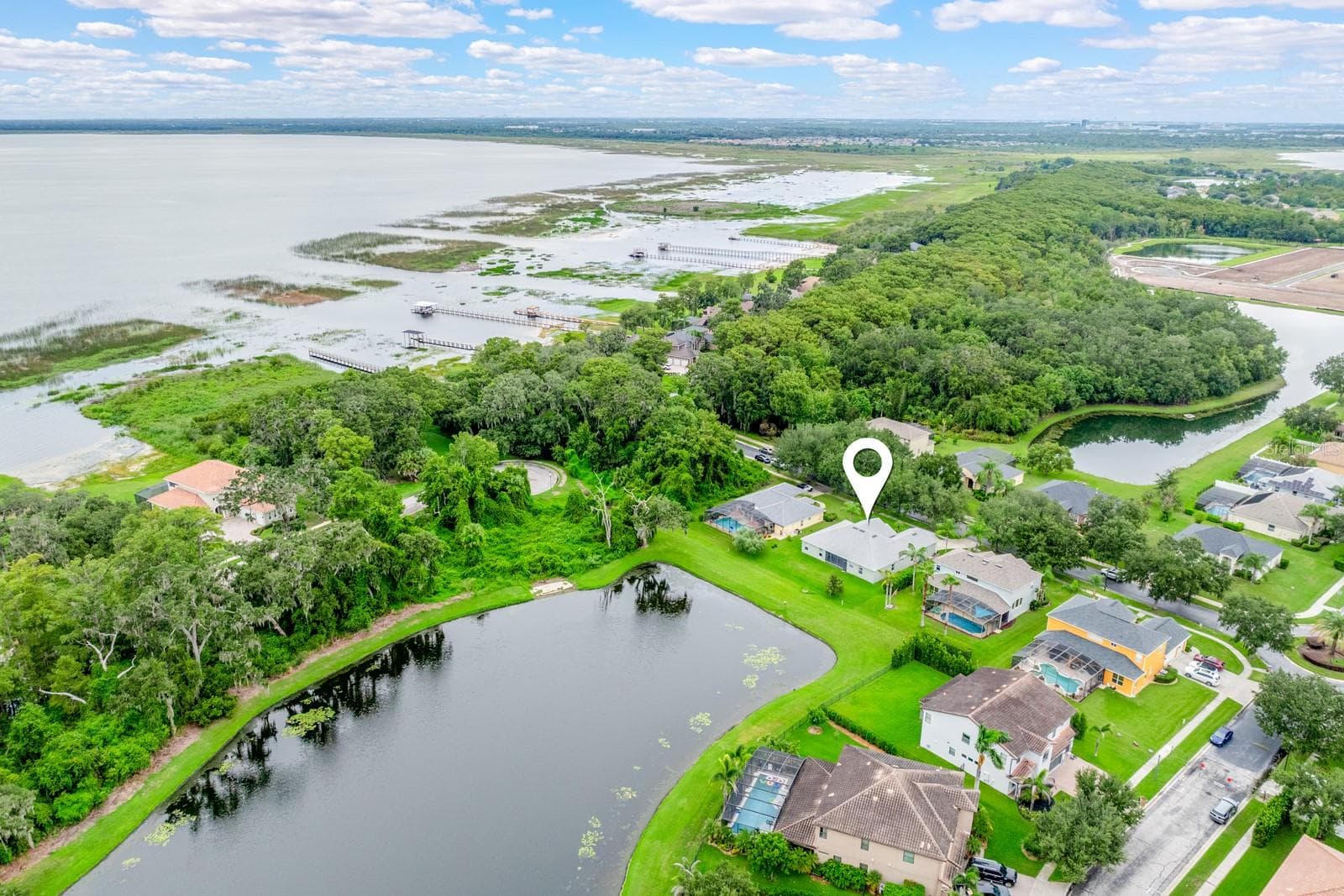 In the perfect location to enjoy a water view and live the lake life! - 4946 LAZY OAKS WAY, ST CLOUD
