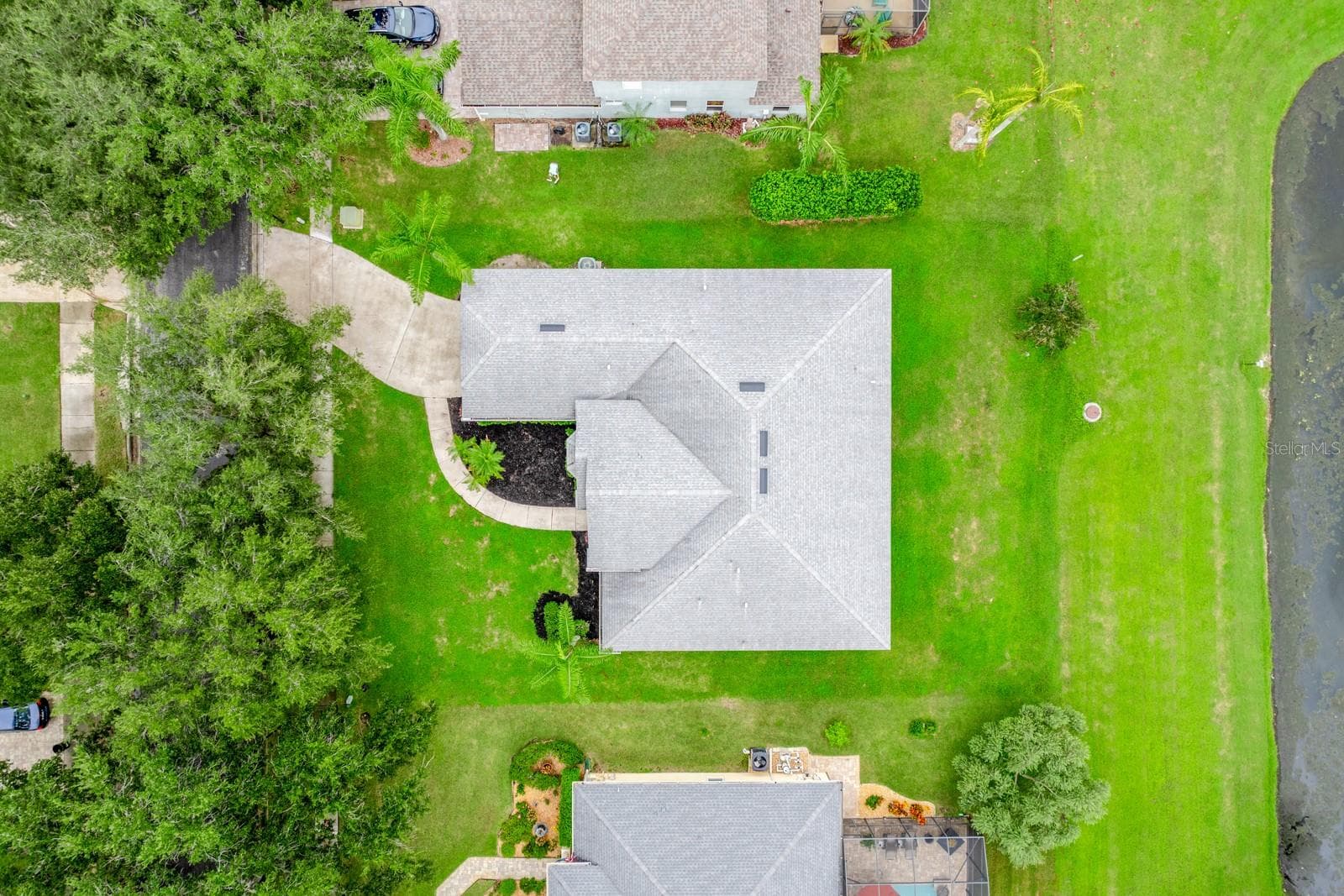 .24 acre lot premium pond lot. - 4946 LAZY OAKS WAY, ST CLOUD