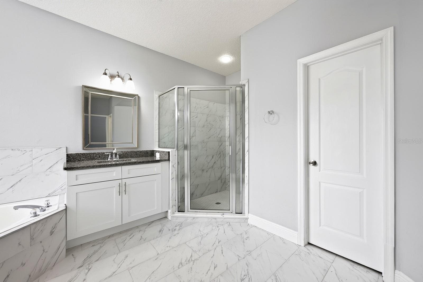 Primary en-suite bath. - 4946 LAZY OAKS WAY, ST CLOUD