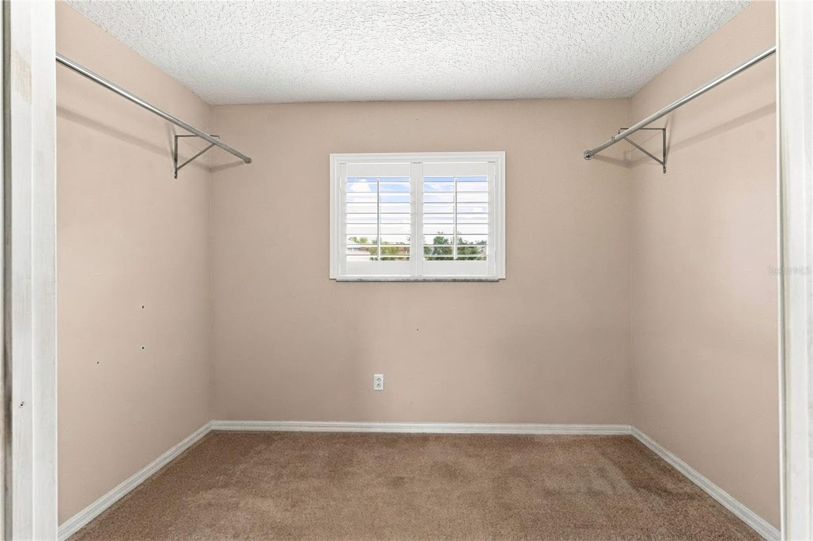 1 of 3 Walk-in Closets Primary Bedroom - 156 BURRELL CIR, KISSIMMEE