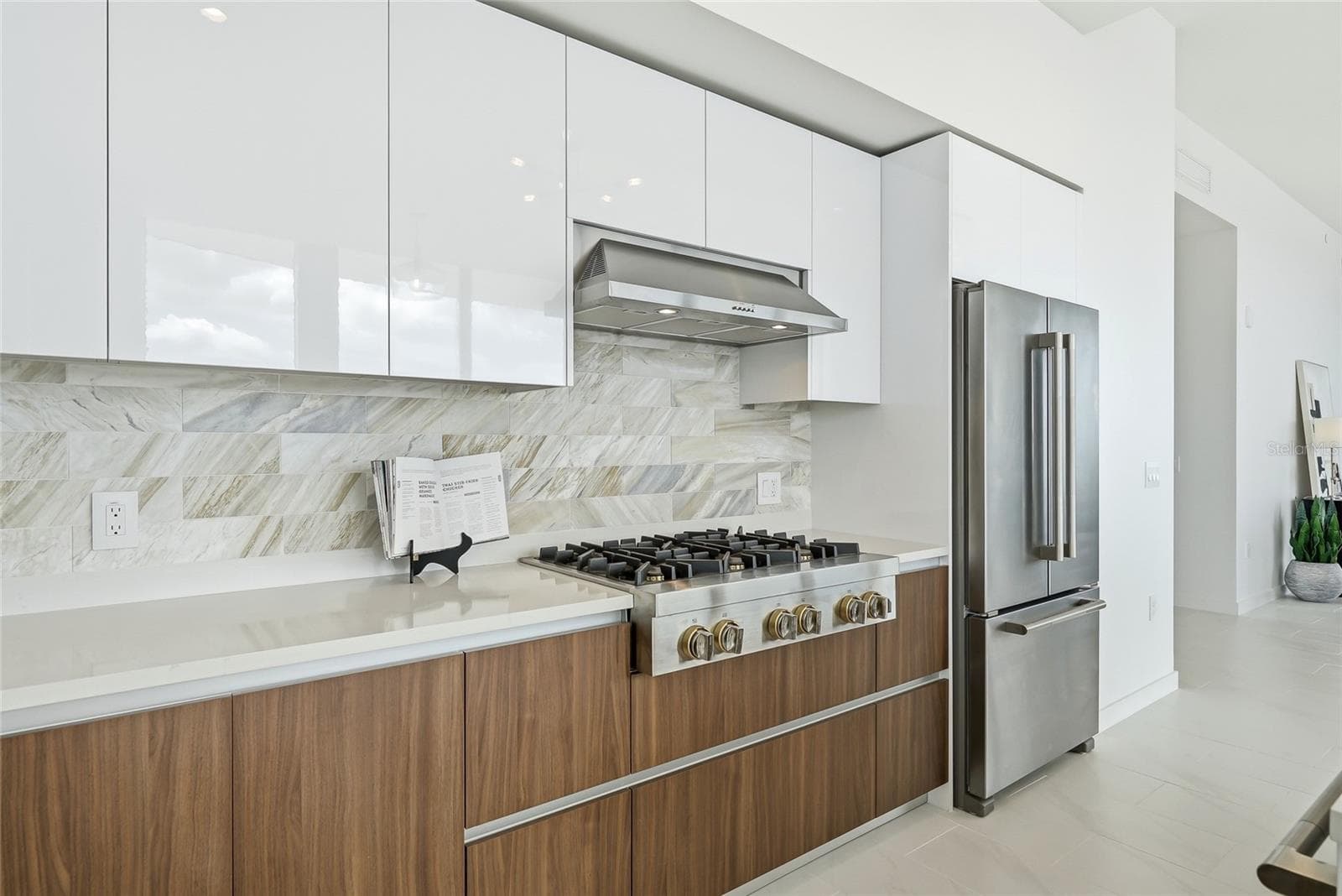 six-burner gas range. - 400 CENTRAL AVE #1901, ST PETERSBURG