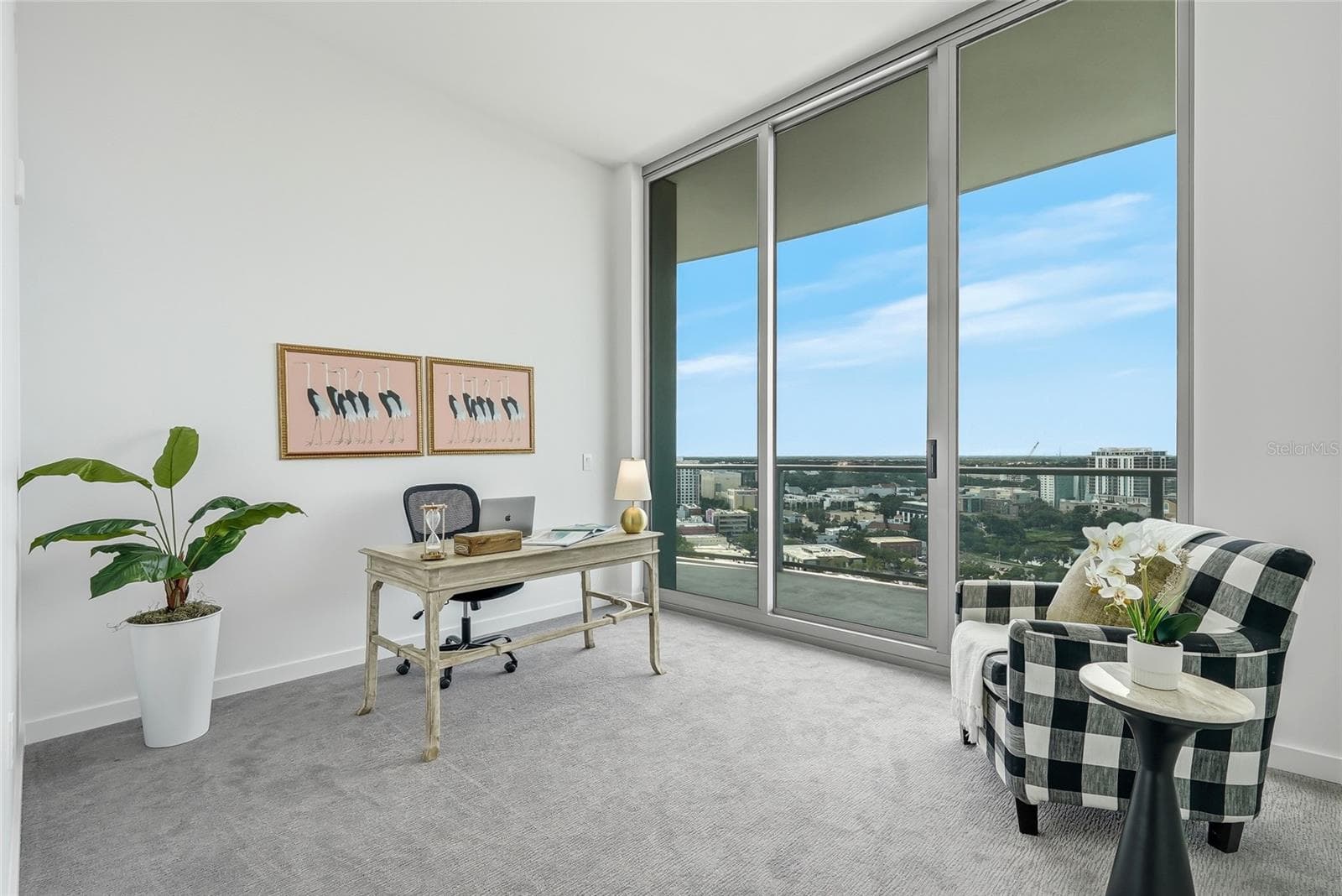 Guest room with private balcony access and north-facing views. - 400 CENTRAL AVE #1901, ST PETERSBURG