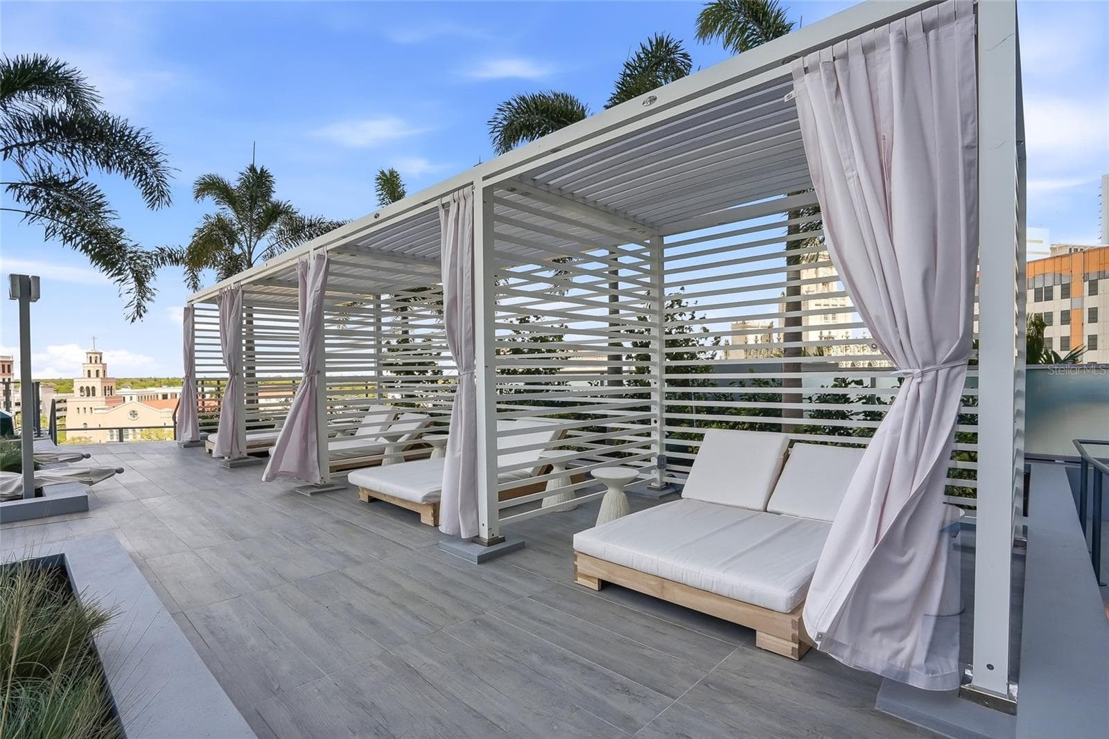 Unwind poolside in the private cabanas. - 400 CENTRAL AVE #1901, ST PETERSBURG