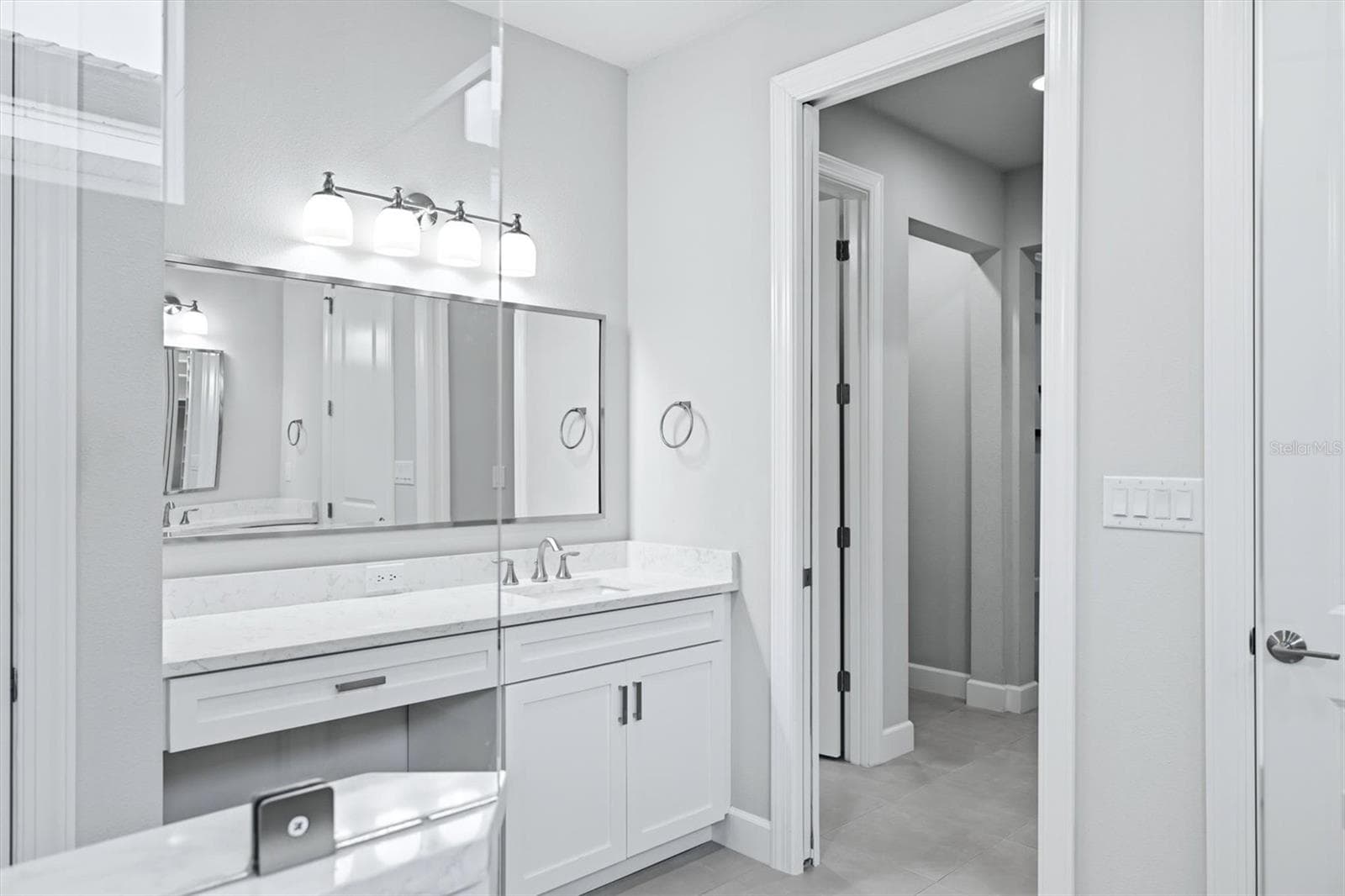 White Finishes Create A Spa-Like Atmosphere - 7717 SANDHILL LAKE DR, SARASOTA