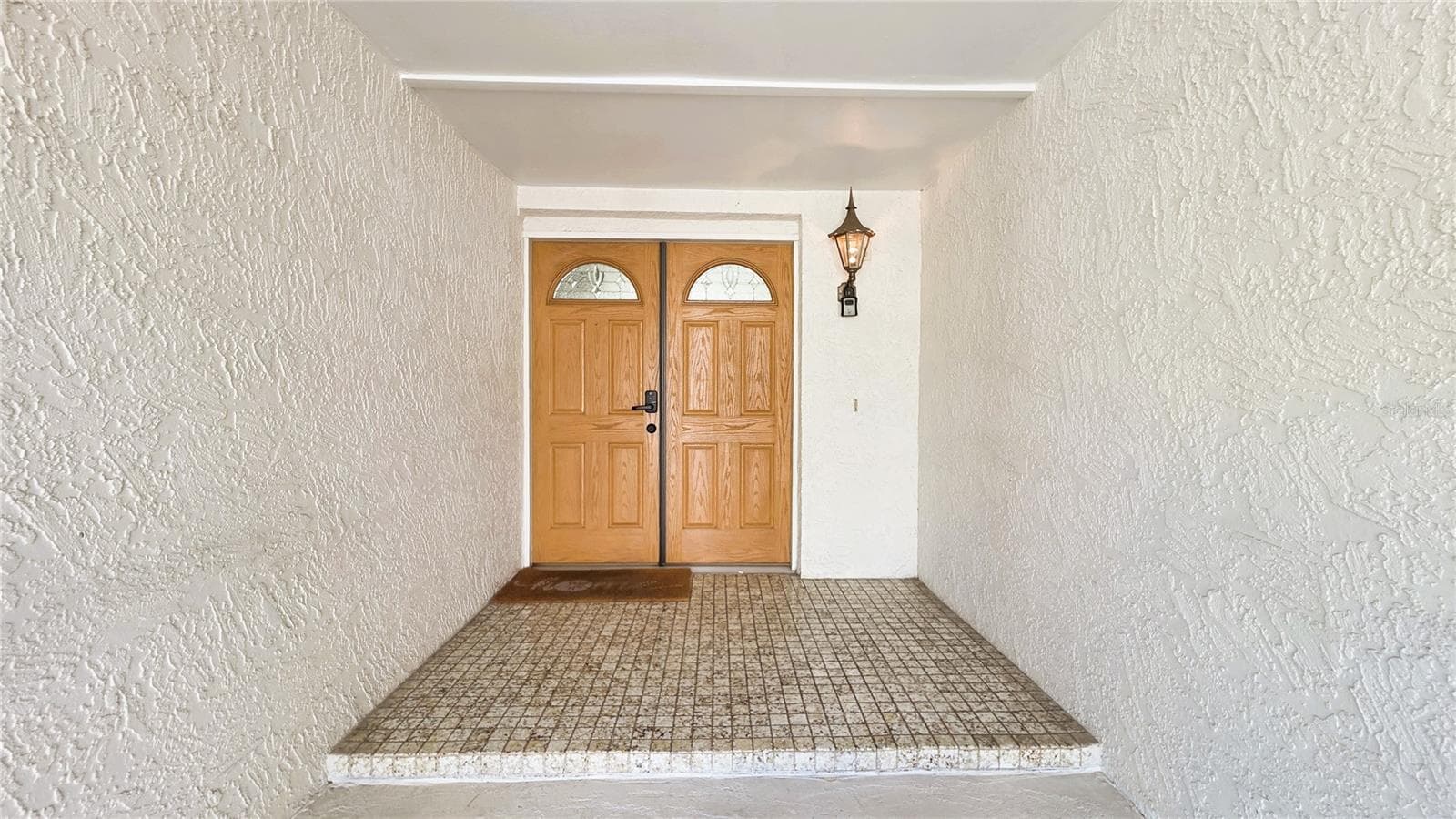 Covered front porch. - 2529 INDIGO DR, DUNEDIN