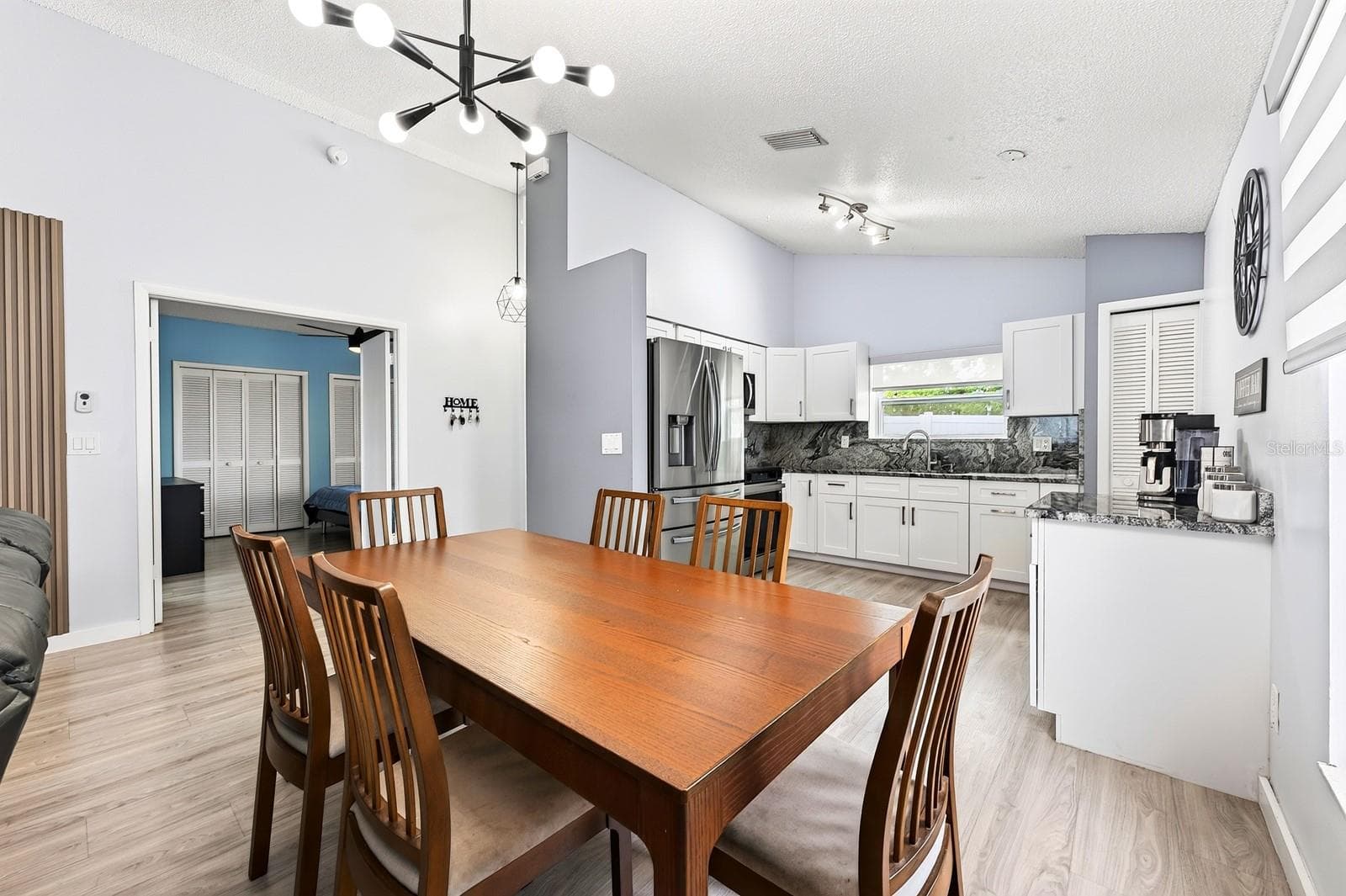 Dining area open to the kitchen. - 9905 DEAN ACRE DR, ORLANDO