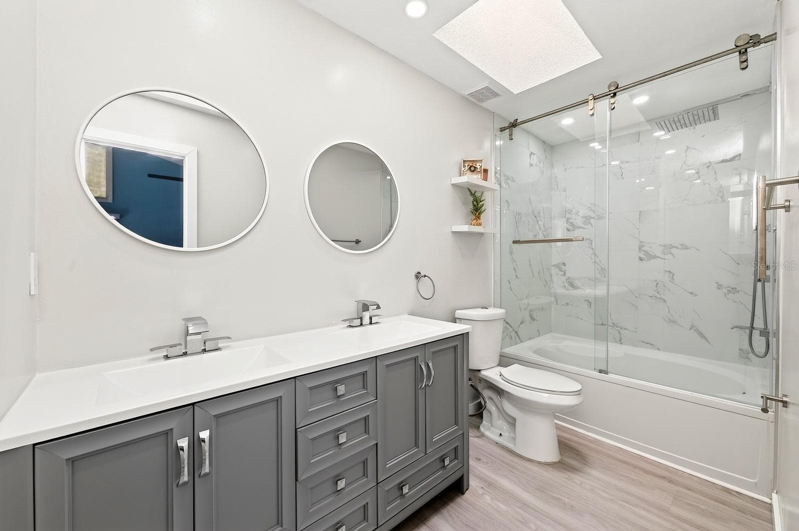 Updated primary en-suite bath. - 9905 DEAN ACRE DR, ORLANDO