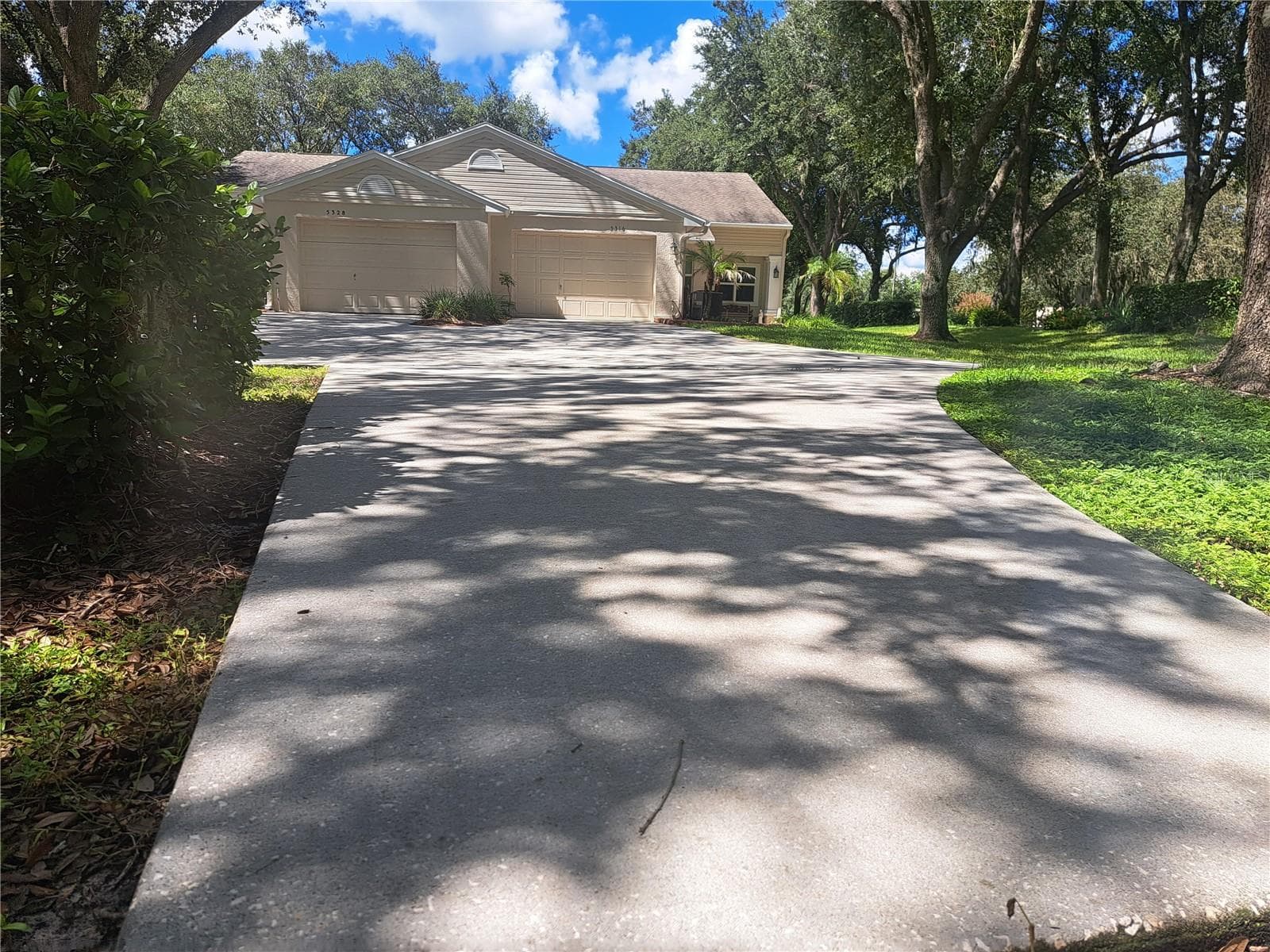 Largest driveway in the community YES belongs to this home lot - 5316 LOCHMEAD TER, ZEPHYRHILLS