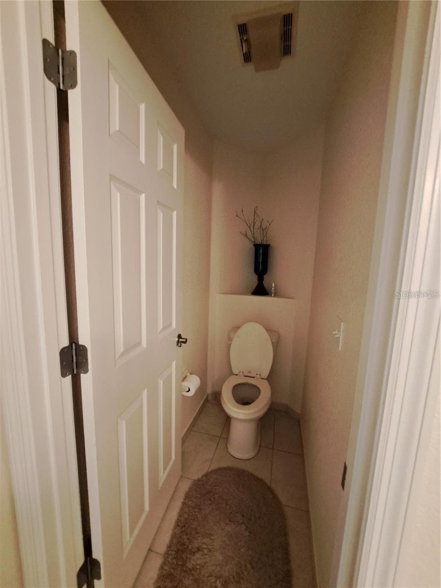 master bath toilet room - 5316 LOCHMEAD TER, ZEPHYRHILLS