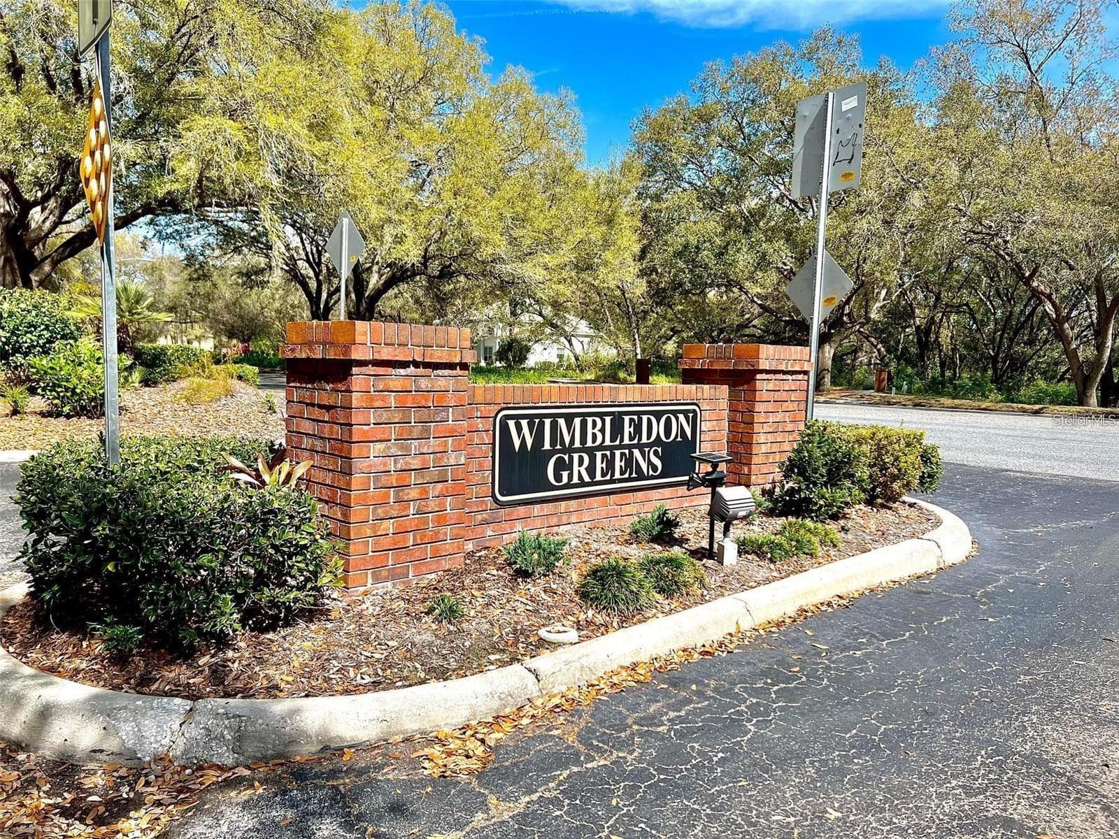 Entry to this small 1 street community - 5316 LOCHMEAD TER, ZEPHYRHILLS