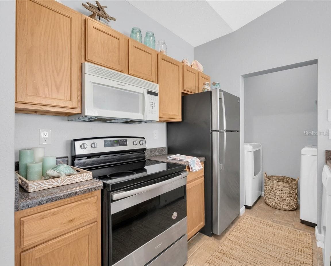 Kitchen and Laundry Room - 10764 70TH AVE #3307, SEMINOLE