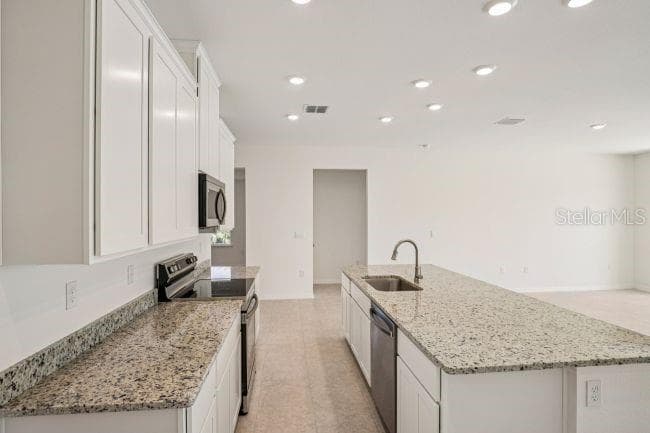 Model home - actual features may vary. - 106 LEE DR, PALM COAST