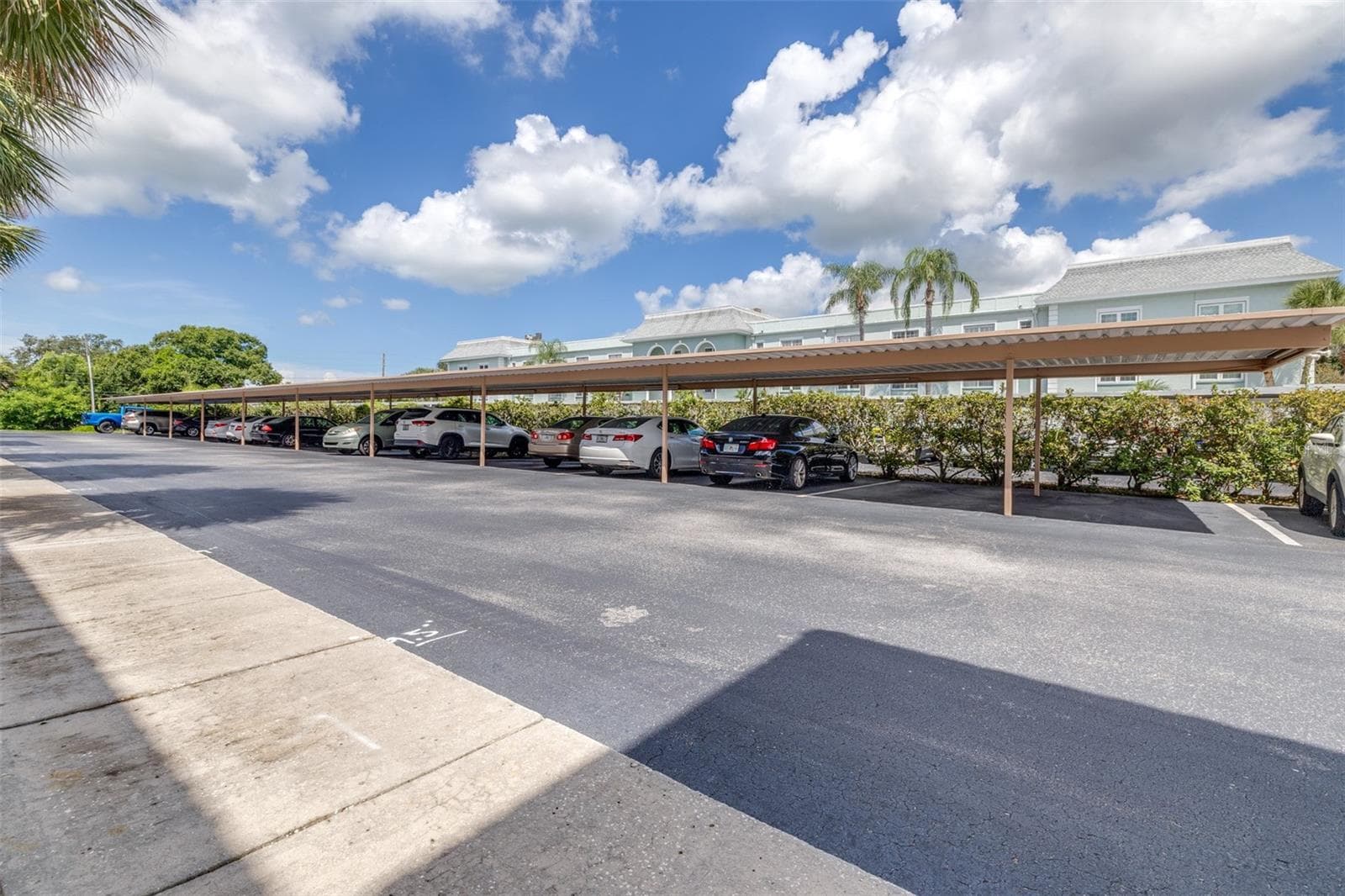 Covered parking directly across from unit - 1750 BELLEAIR FOREST DR #A8, BELLEAIR