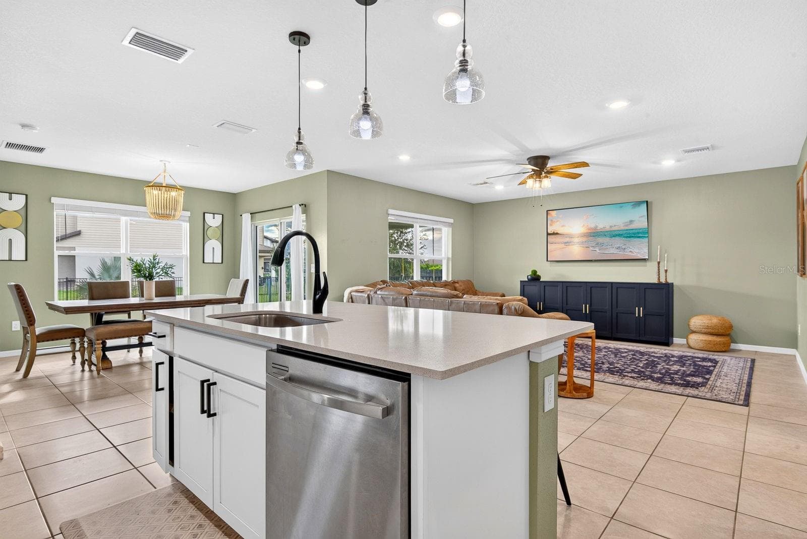 Wide angle facing into dining and living from kitchen - 9348 ROYAL RIVER CIR, PARRISH
