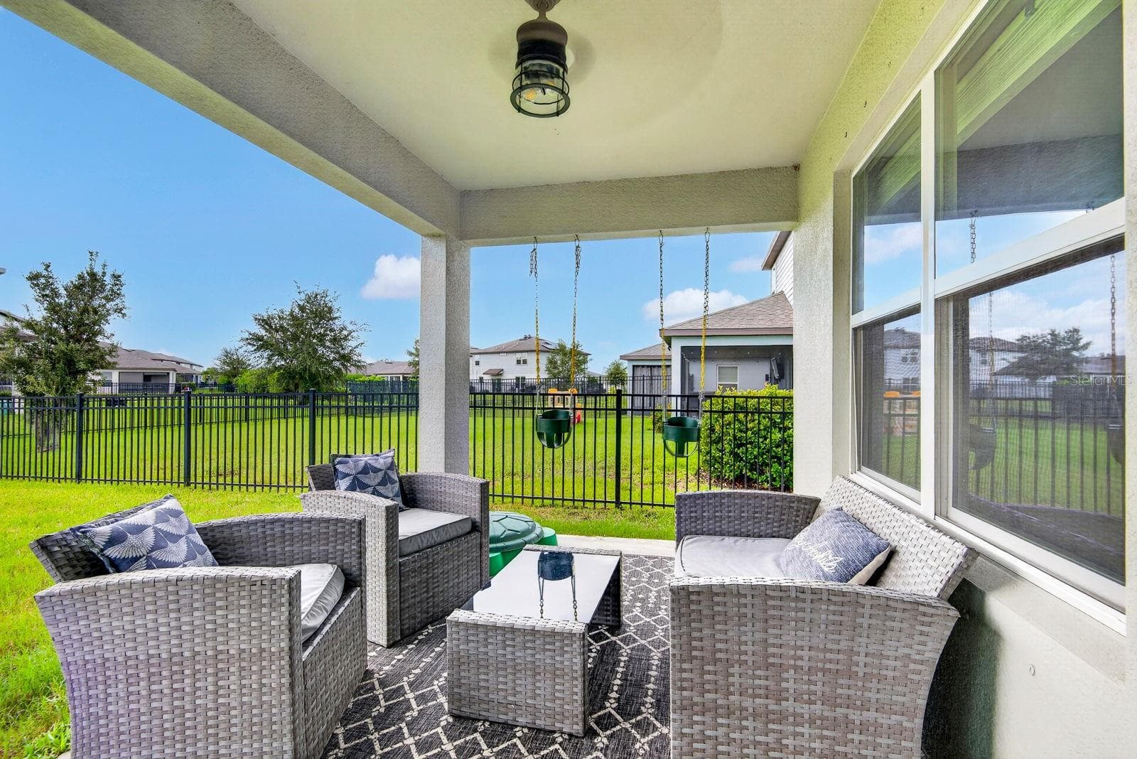 Outside lanai with fully fenced yard - 9348 ROYAL RIVER CIR, PARRISH