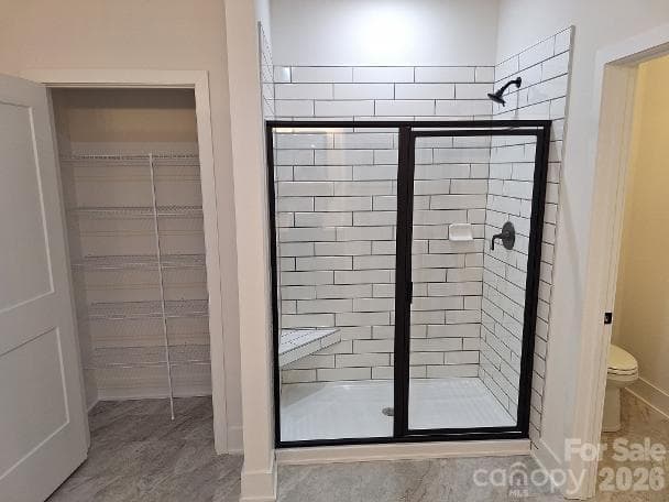 Primary Bathroom Shower and Linen - 5143 Colchester Court, Catawba