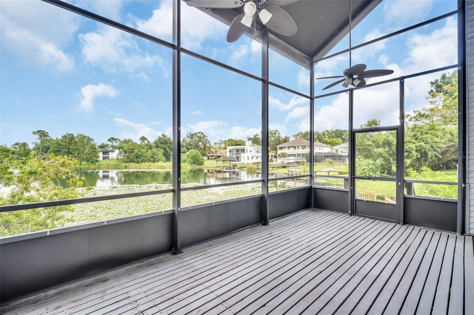 Back screened in patio overlooking Boot Lake - 9723 TIFFANY OAKS LN #3B, TAMPA