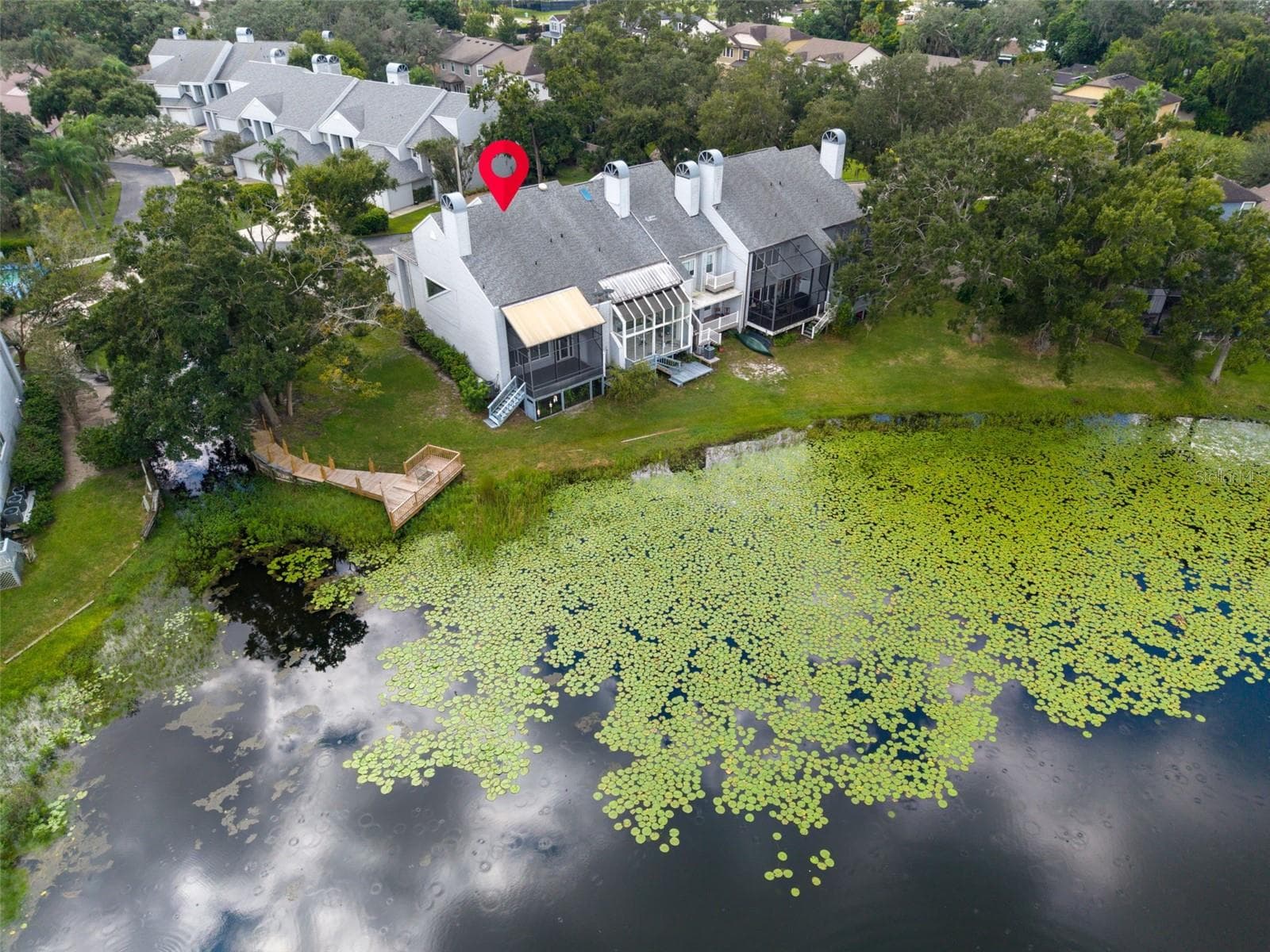 Aerial View of property and Boot Lake - 9723 TIFFANY OAKS LN #3B, TAMPA