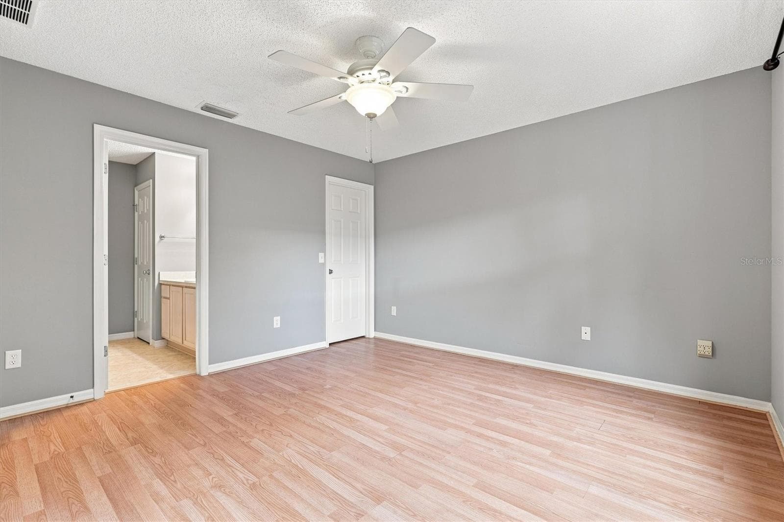 Primary bedroom: "Primary bedroom, 3-bedroom Corpus Christi floor plan, The Villages" - 3565 IDLEWOOD LOOP, THE VILLAGES