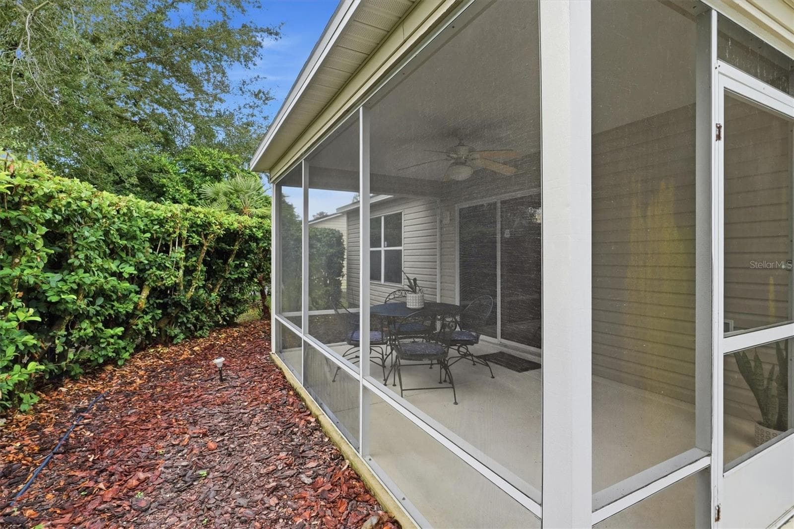 Lanai: "Private east-facing screened lanai for morning coffee and evening entertaining" - 3565 IDLEWOOD LOOP, THE VILLAGES