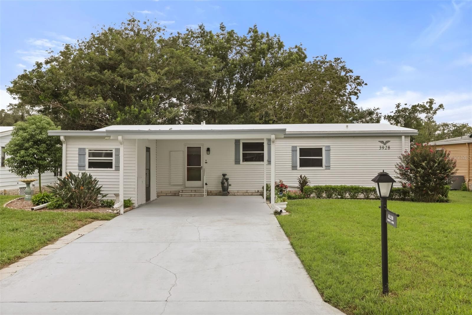 Double Carport Low Step Entry Accessibility - 3928 N CITRUS CIR #691, ZELLWOOD