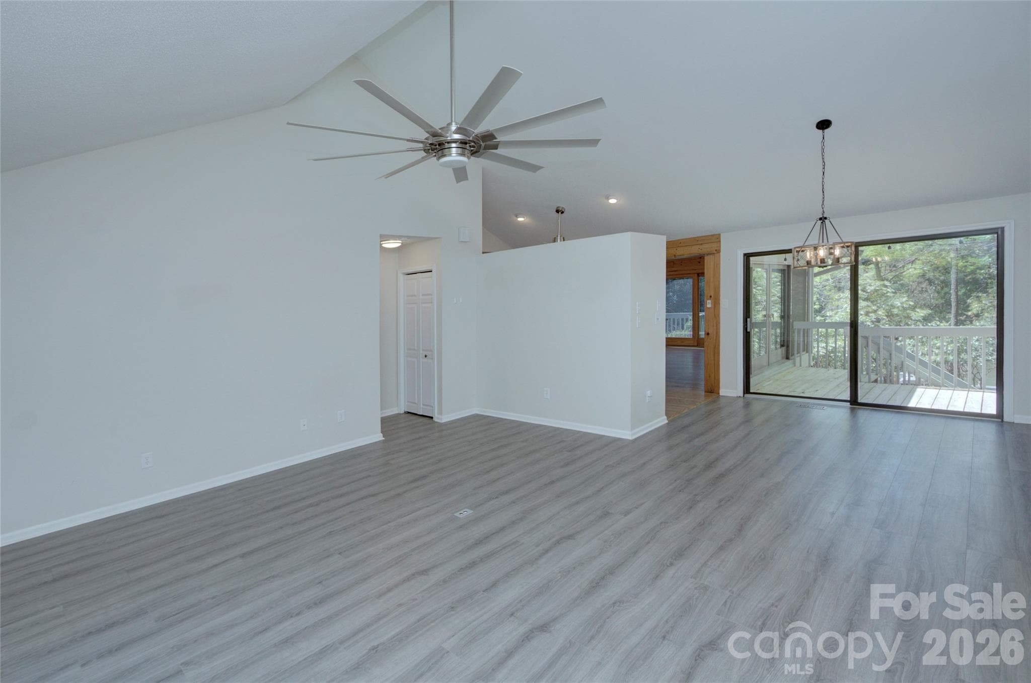 Living room and dining room view - 960 Middle Connestee Trail, Brevard