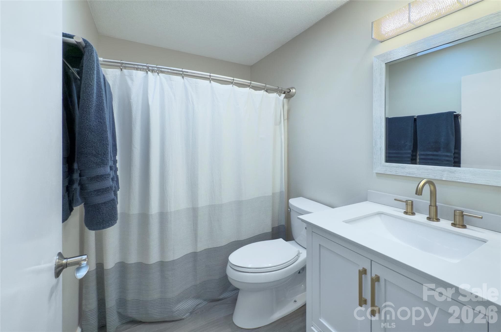 Updated Bathroom located between Bedroom 2& 3 - 960 Middle Connestee Trail, Brevard