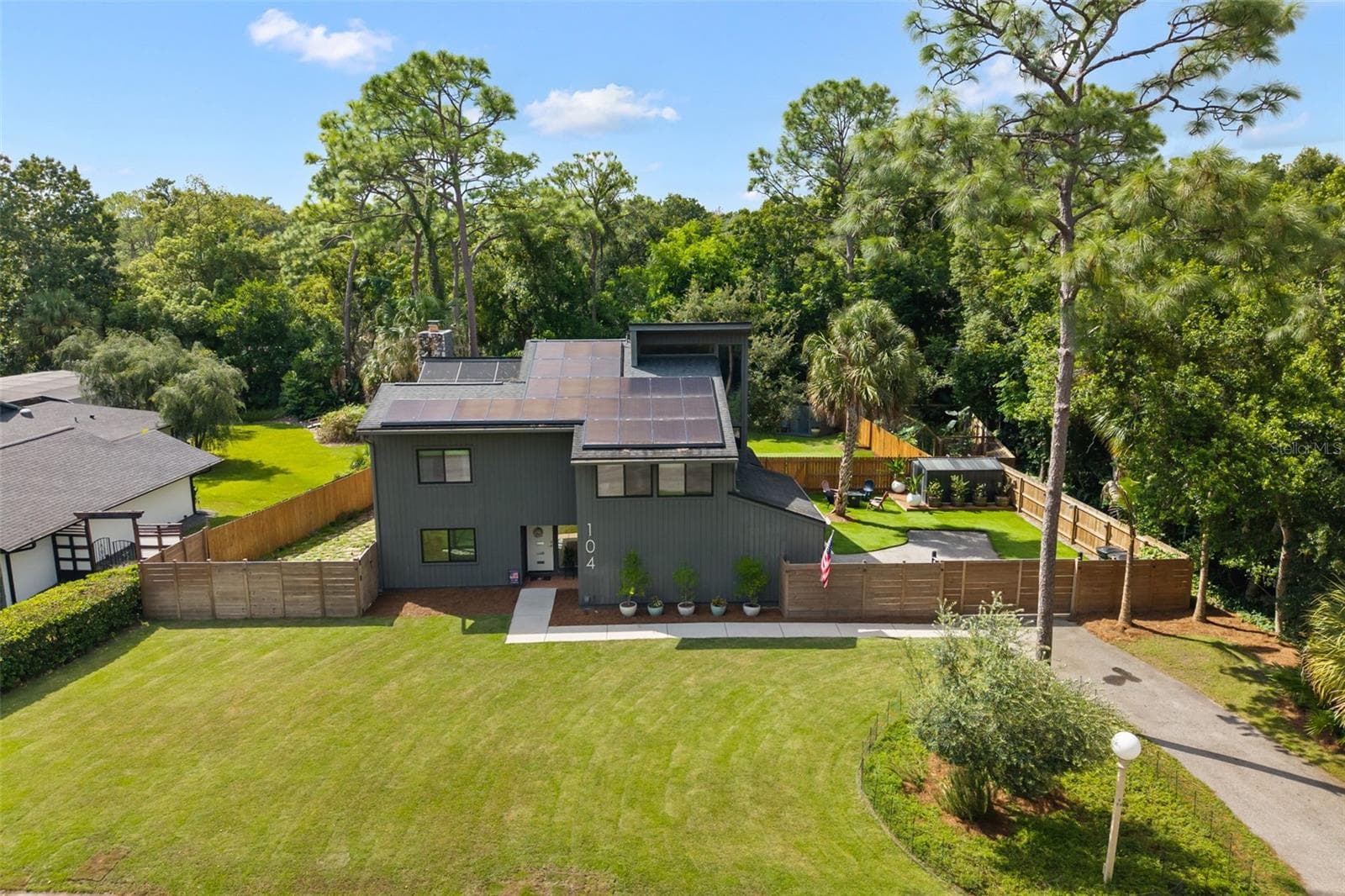 Tesla Solar panels are paid off and convey - 104 WILD FERN DR, LONGWOOD