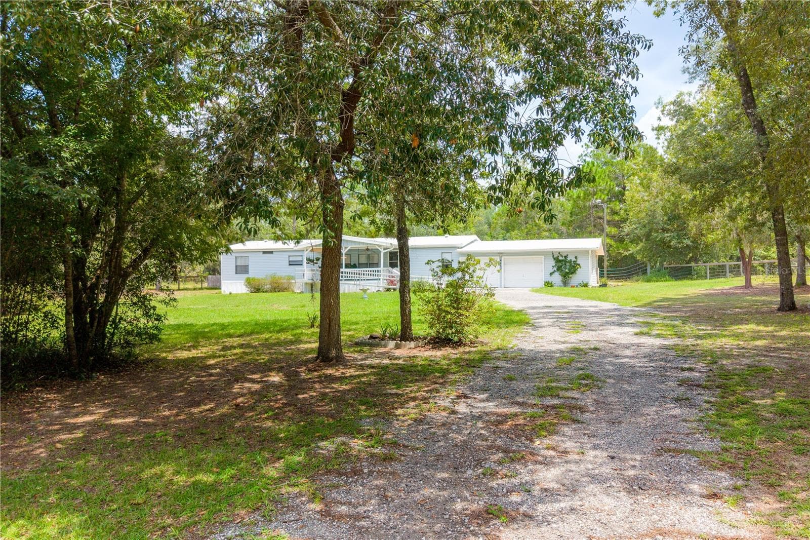 Manufactured Home at 6863 DEER SPRINGS RD, KEYSTONE HEIGHTS, photo 2 of 49
