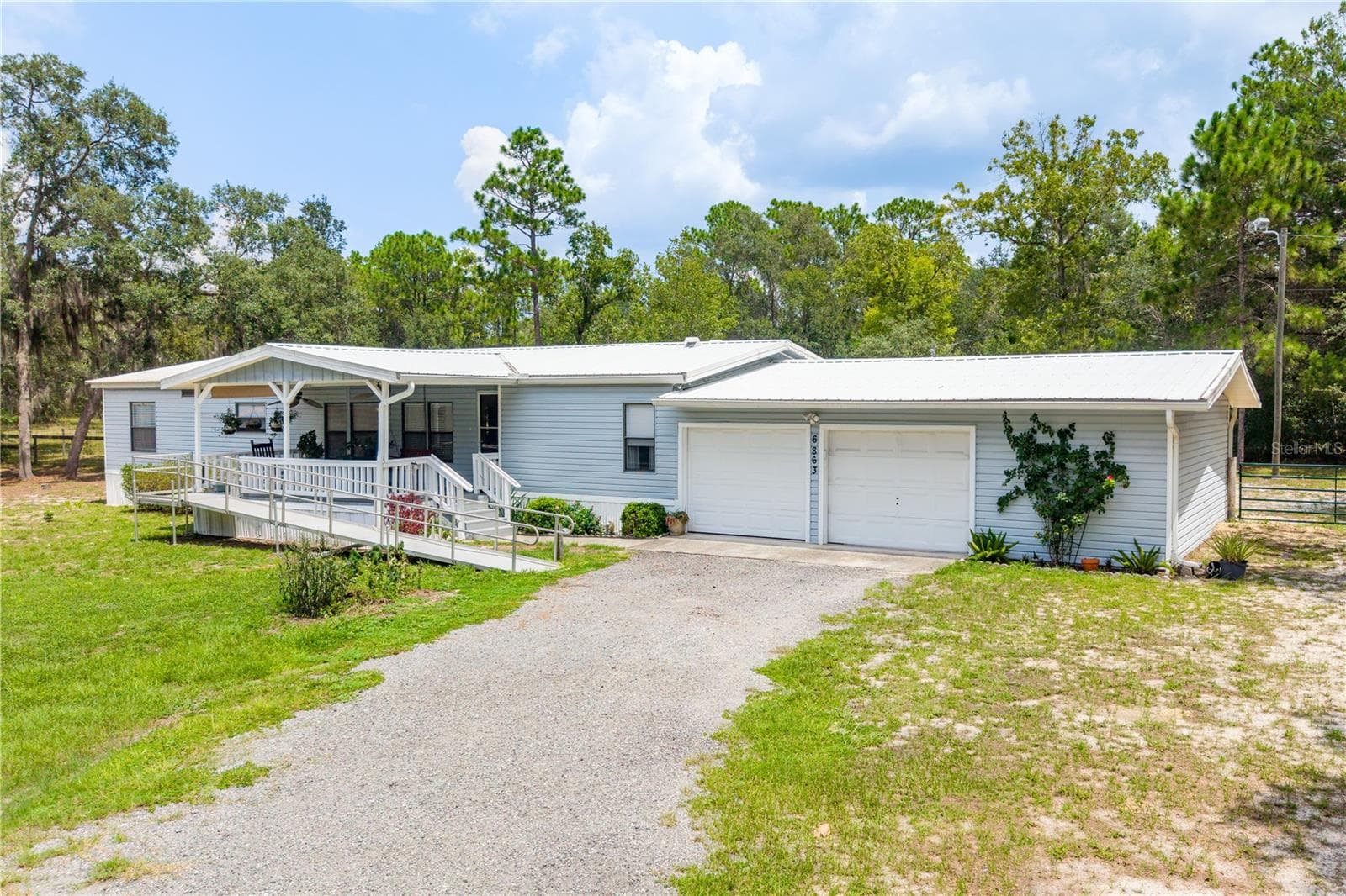Manufactured Home at 6863 DEER SPRINGS RD, KEYSTONE HEIGHTS, photo 3 of 49