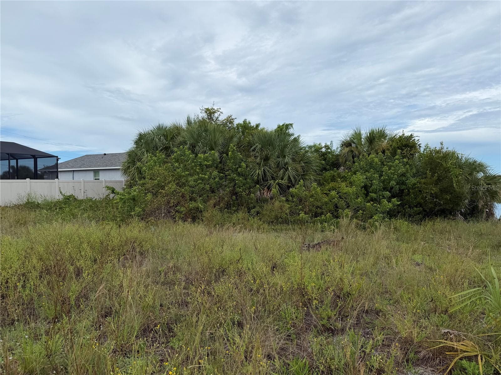 Single Family Residence at 10385 HARLINGEN ST, PORT CHARLOTTE, photo 2 of 64