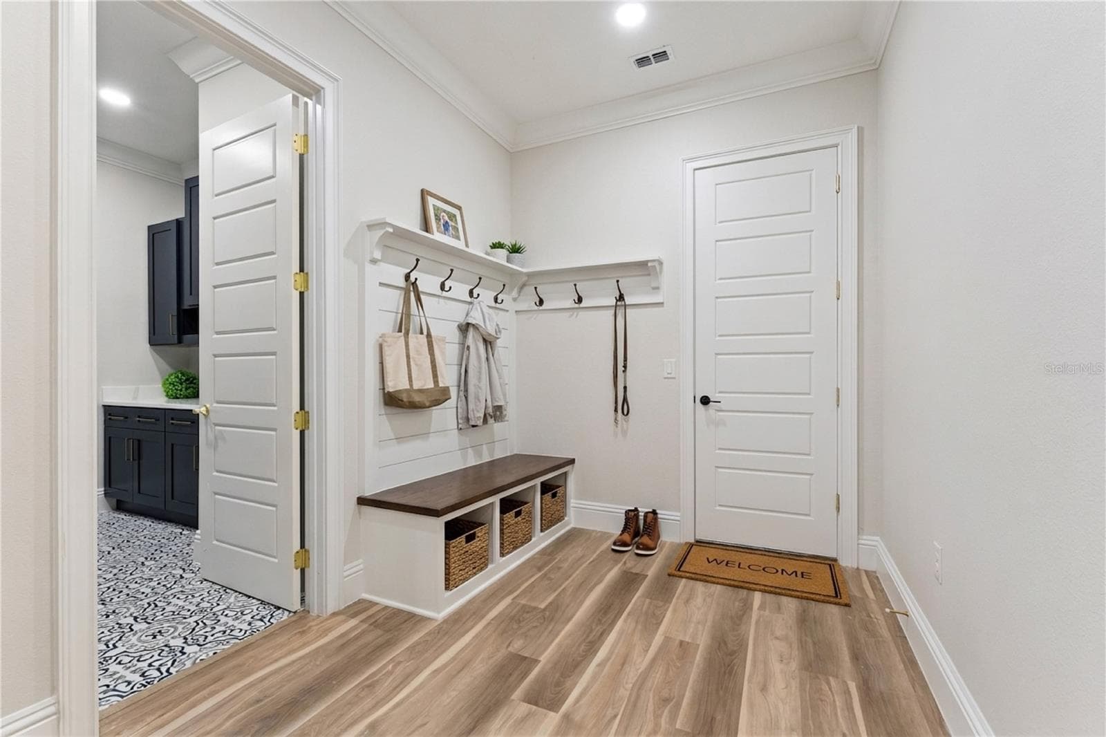 Virtual staged. Mud Room - 1614 JEANETTE ST, APOPKA