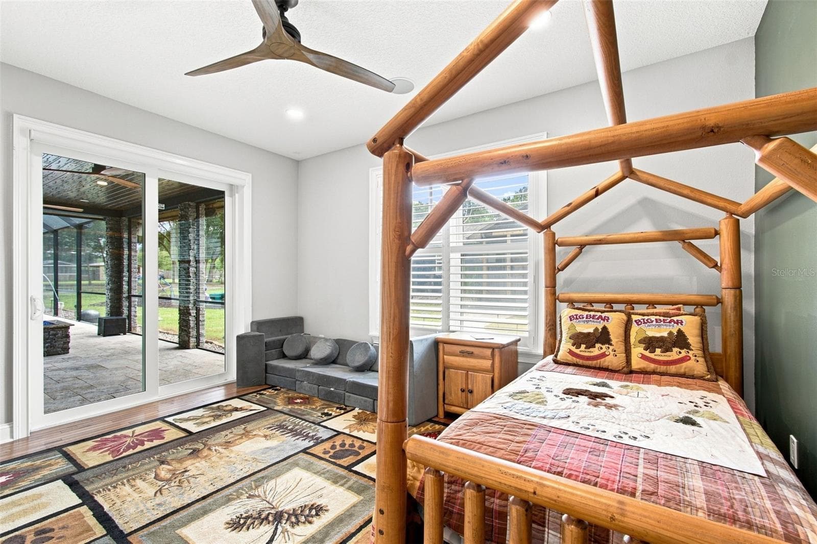 BACK BEDROOM WITH LANAI ACCESS - 14122 CHESTERFIELD TRL, HUDSON
