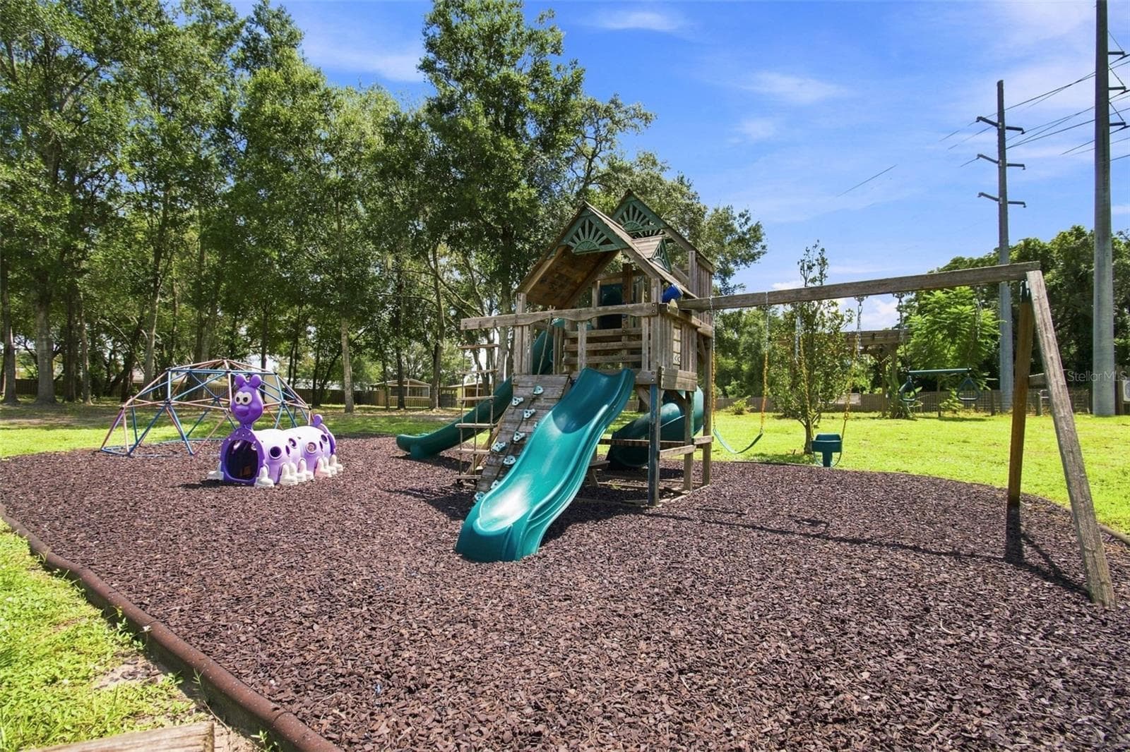 RUBBER MULCH KEEPS THE PLAYGROUND IN GREAT ORDER - 14122 CHESTERFIELD TRL, HUDSON