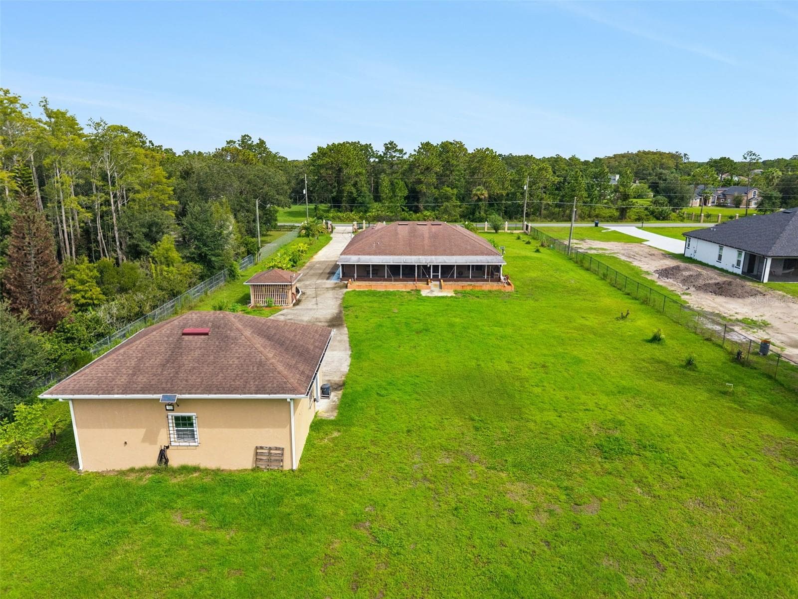View from the rear of the property - 1.74 acres - 19532 SHELDON ST, ORLANDO